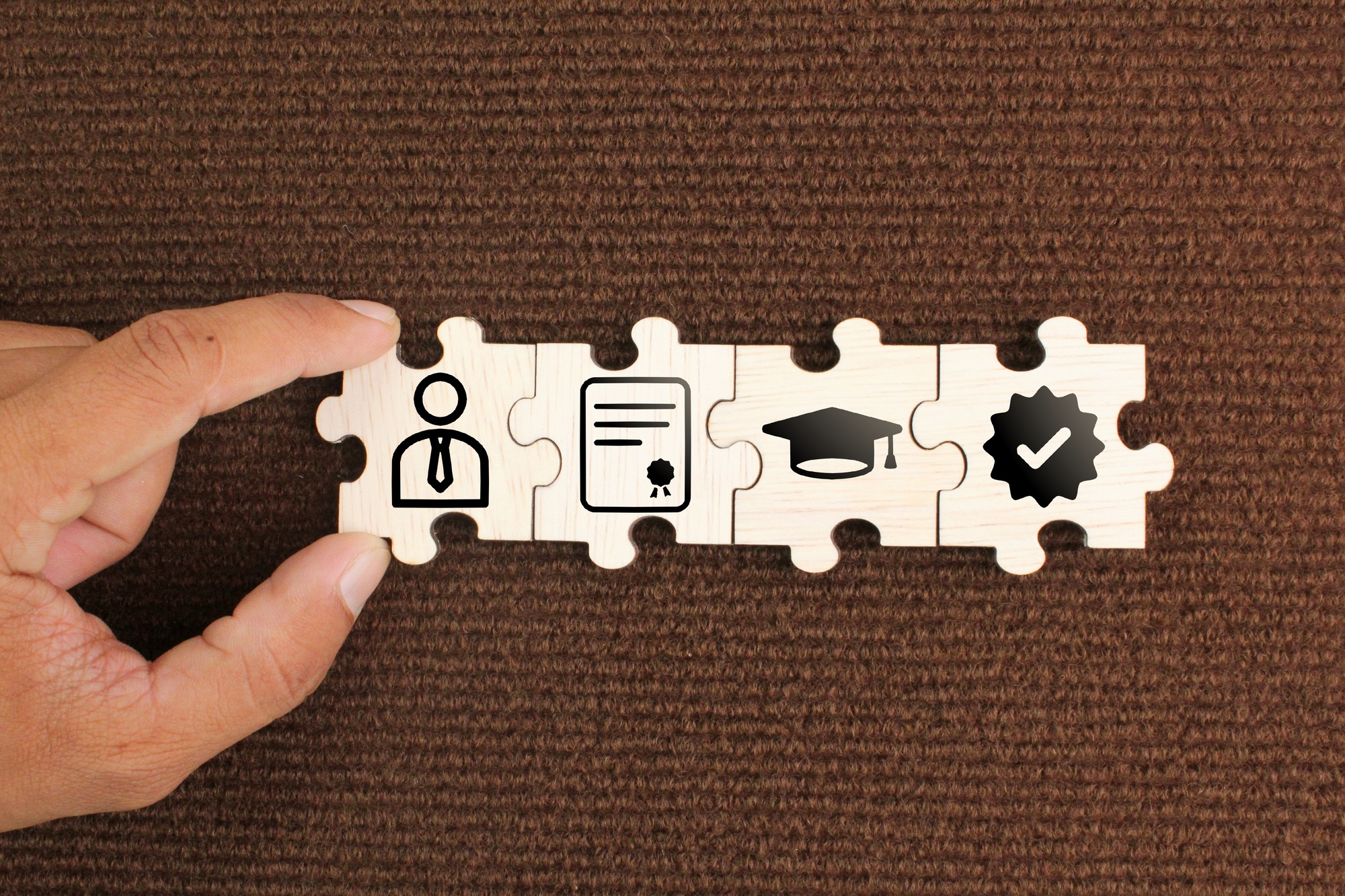 puzzle with qualifications, certificates and graduate icons.