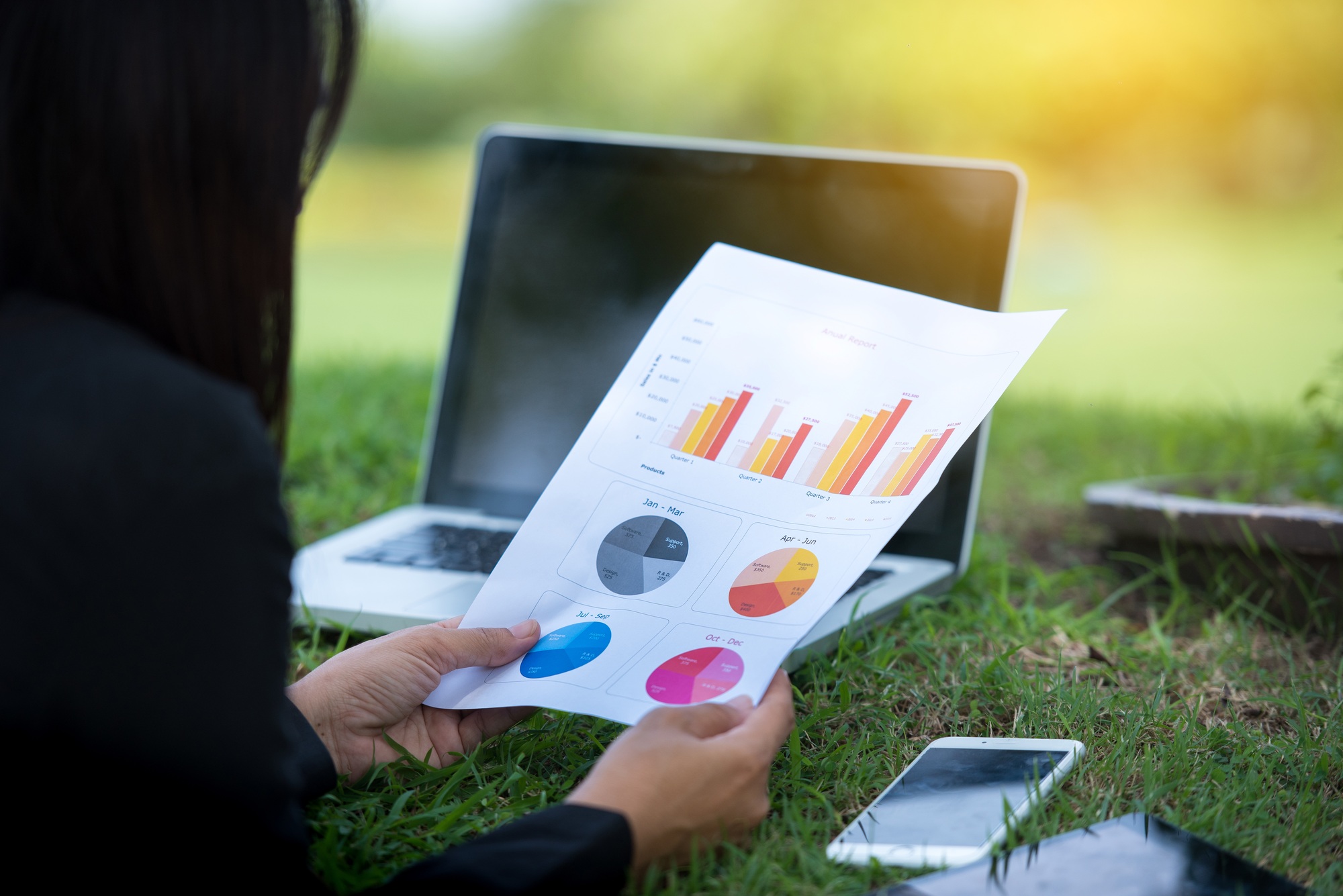 Relaxed Sales Managers Working Outdoor. Working Woman Showing market Report