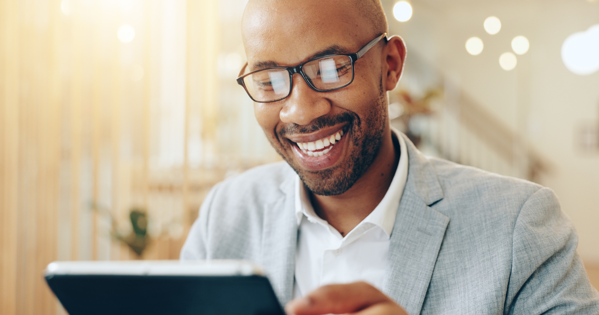 Research, online and black person with tablet, laughing and app for user experience and web designe