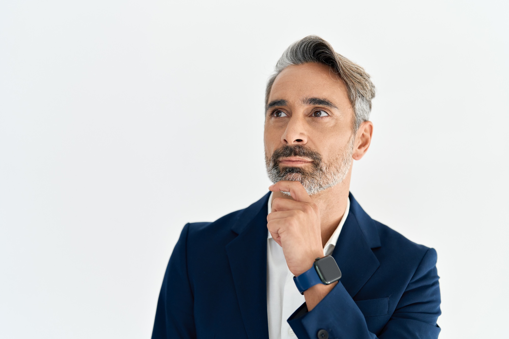 Serious middle aged business man entrepreneur thinking on business challenge.