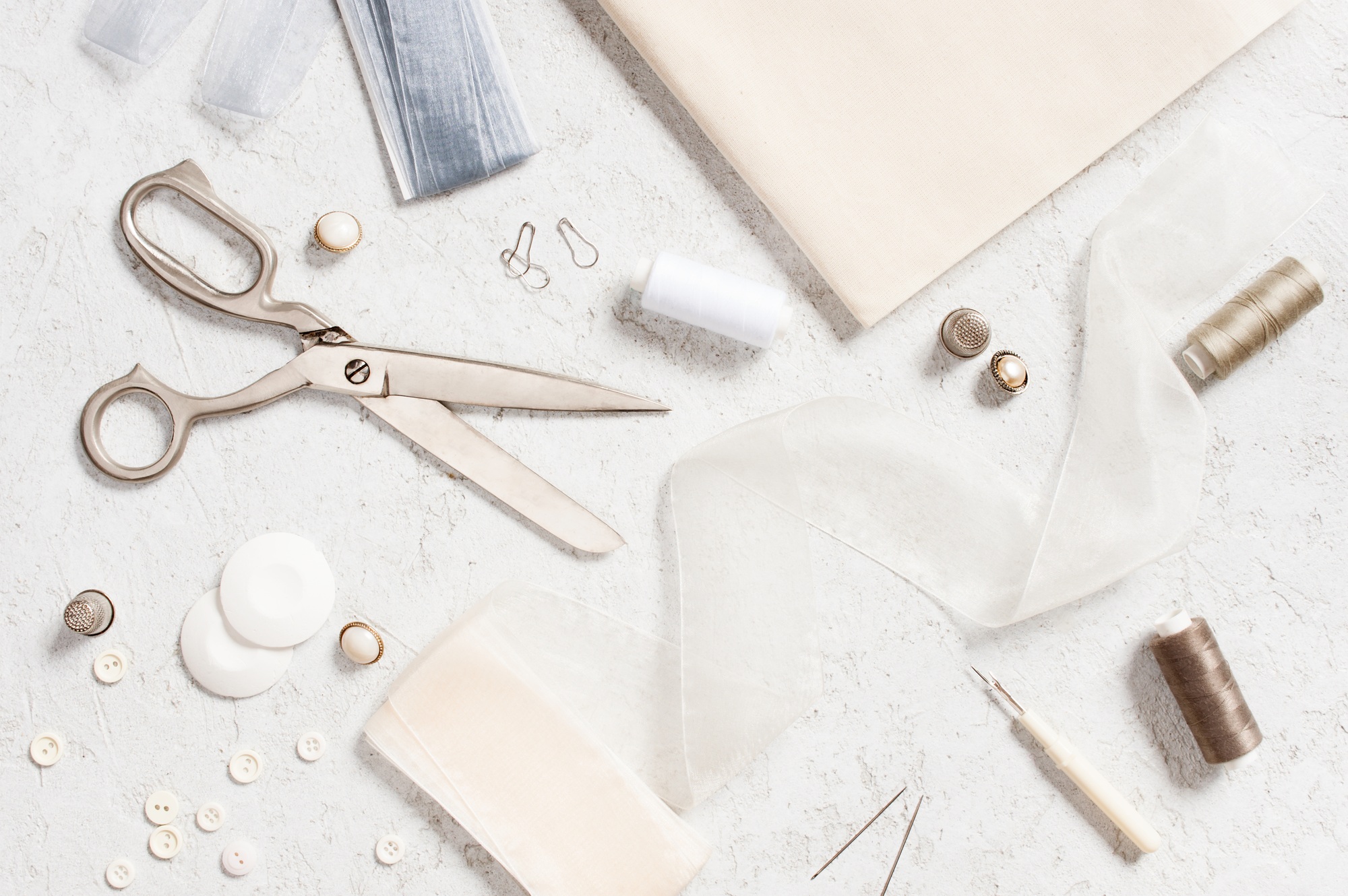 Sewing Supplies on the White Table