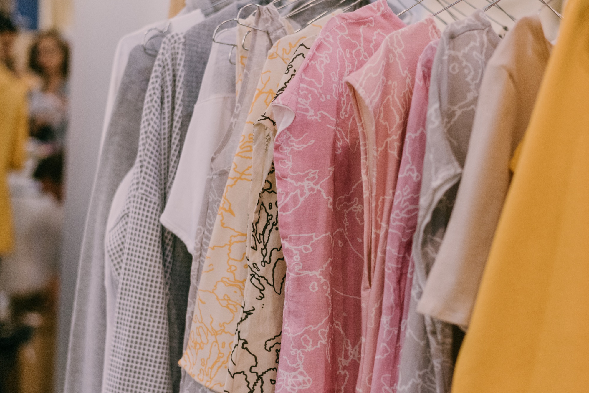 Shirts and dresses. Shopping for clothes, local design market. Sustainable fashion. Shop locally.