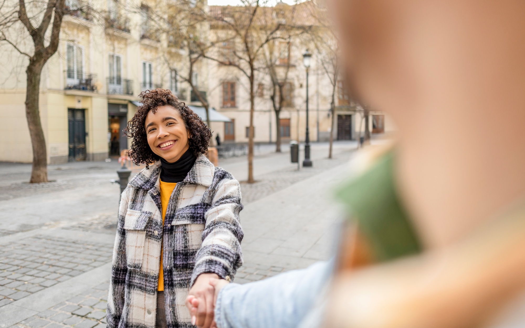 Smiling Woman Holding Hand Leading Partner