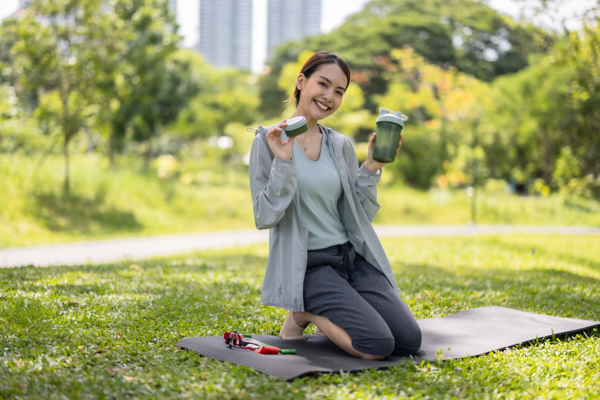 Social Media Influencer Demonstrates Protein Powder Benefits in Outdoor Setting During Live Stream