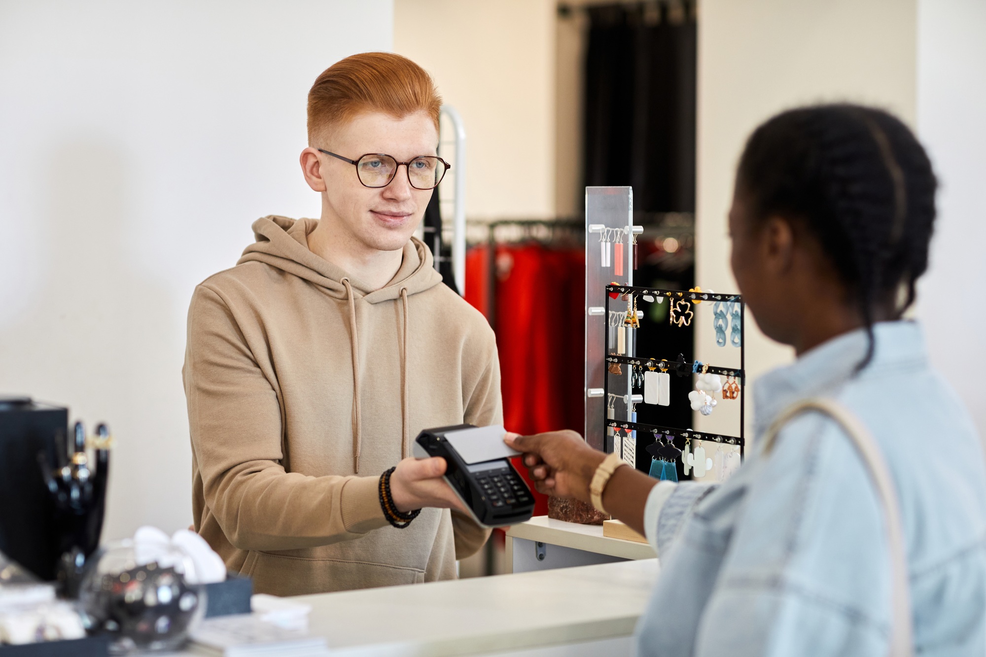 Store manager processing credit card payment