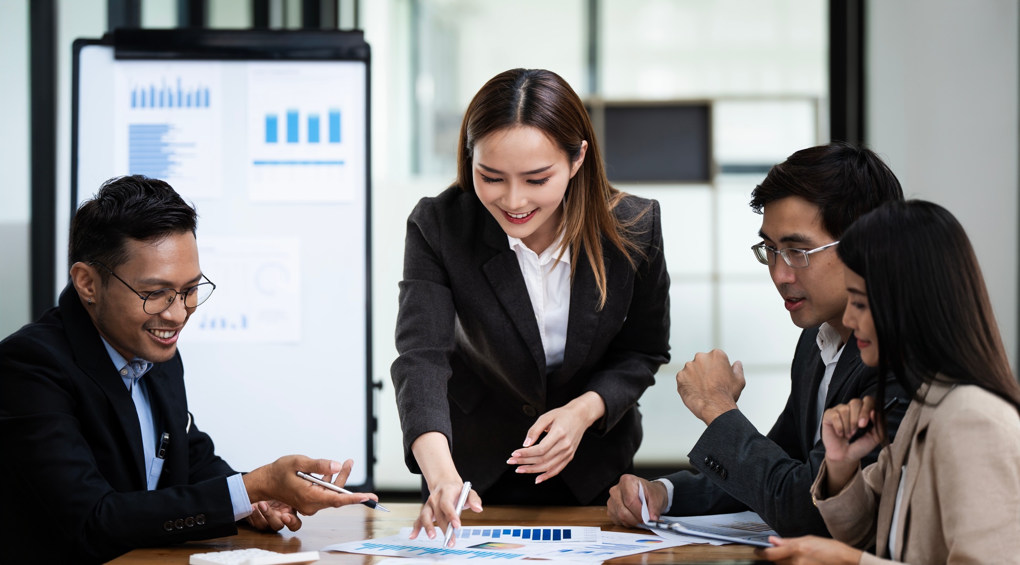 Strategy teamwork and business people in office, planning and brainstorming with financial report.