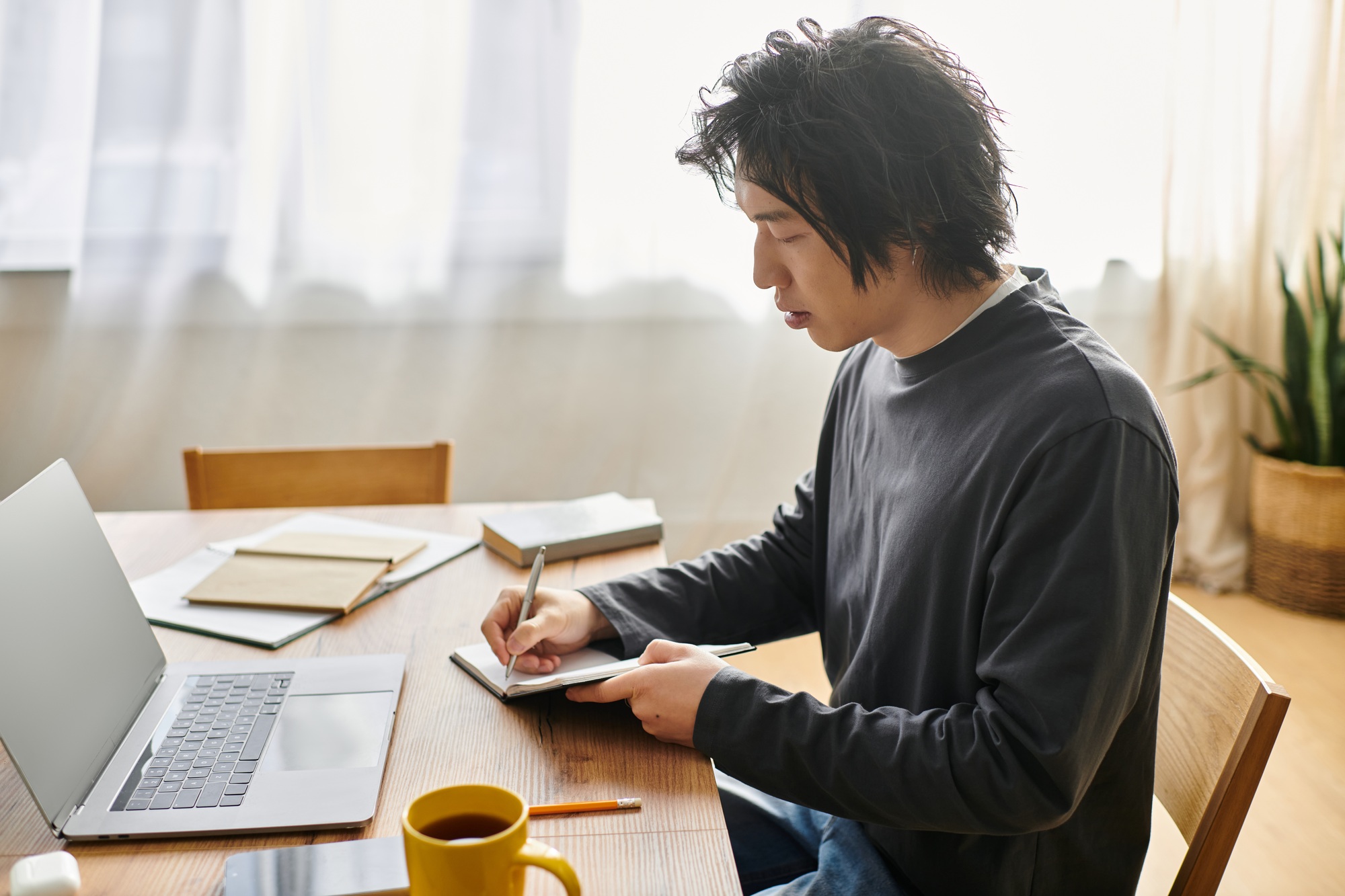 Student engaged in online learning at home with a focus on education and personal growth