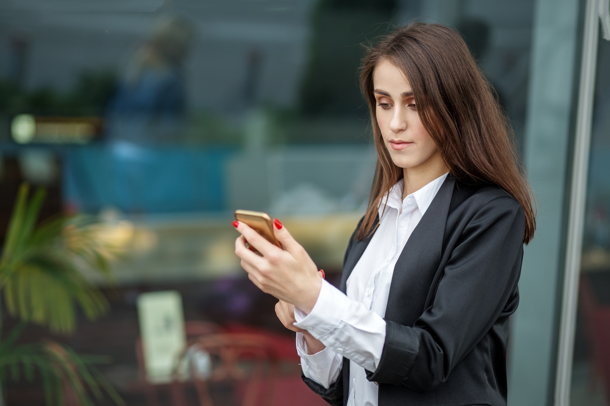 Successful business woman chatting on internet. Concept of Internet, technology, business