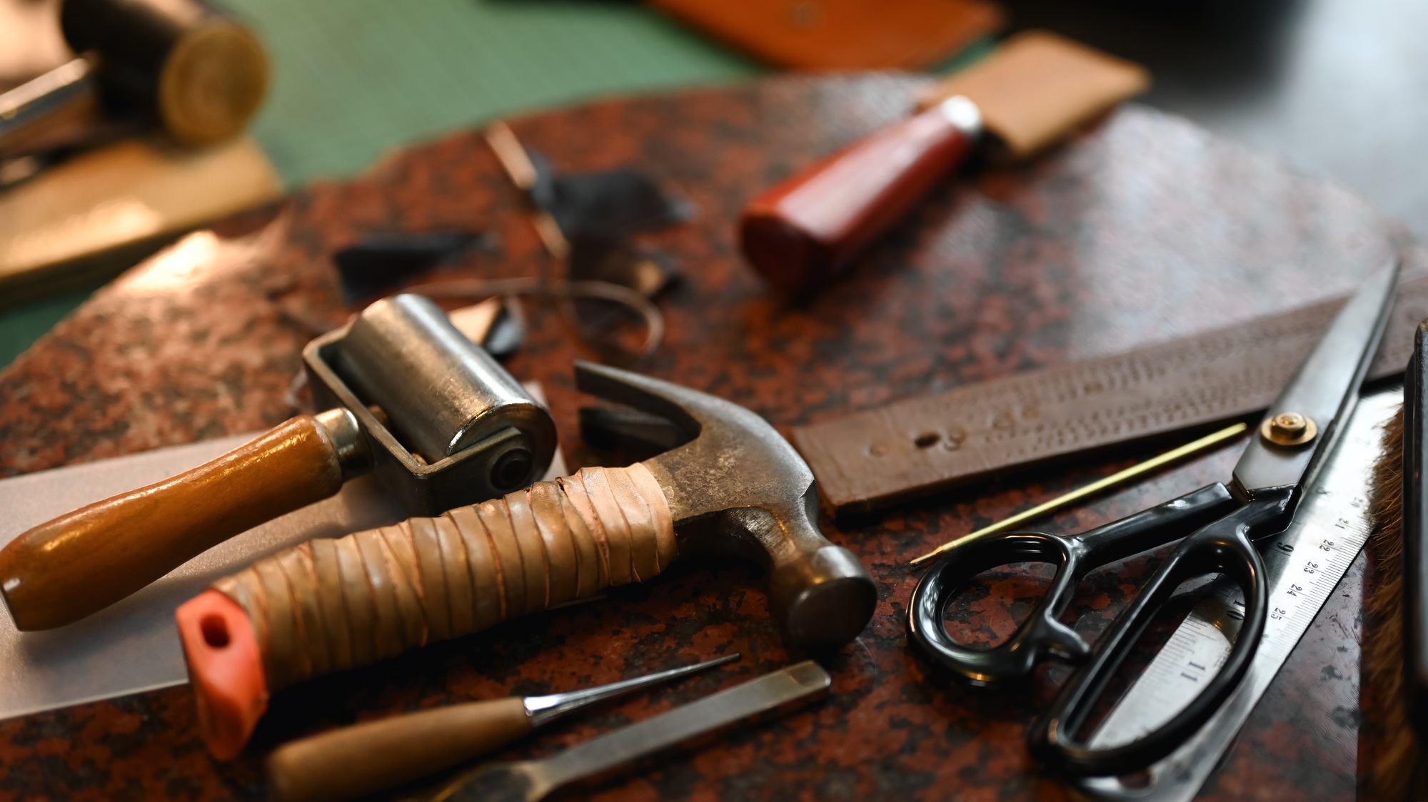Tailor products and craft work tools on the workbench. Small business and handmade concept.