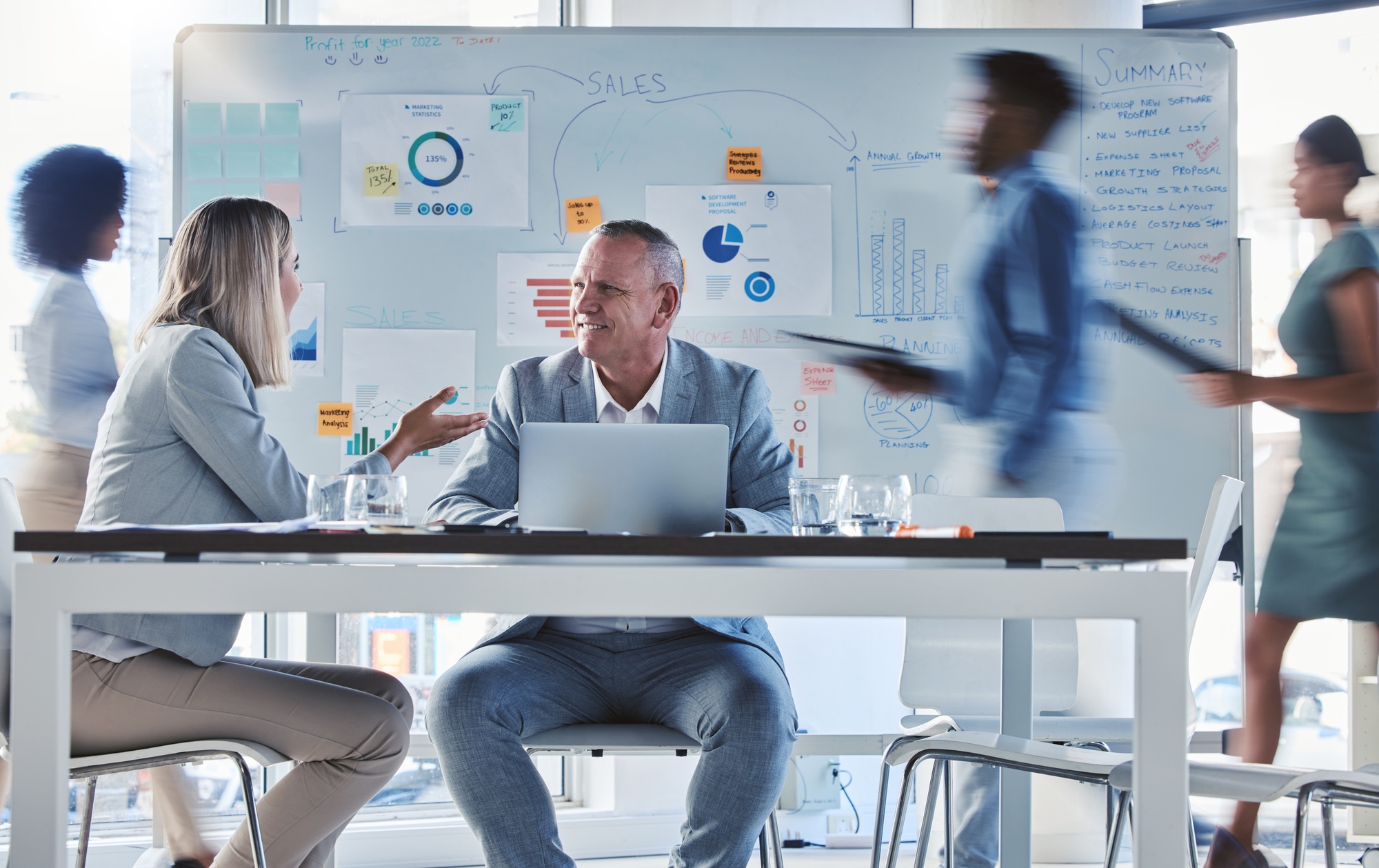 Team, workers or employee collaboration and planning a business growth strategy together in an offi