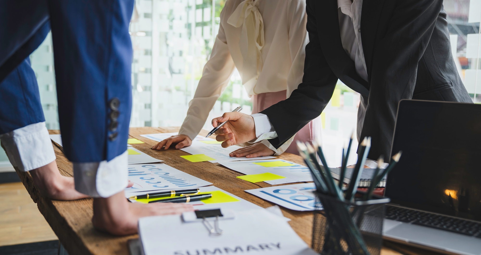 Teamwork with businesspeople analysis cost graph, Business Corporate brainstorming, Planning Strateg