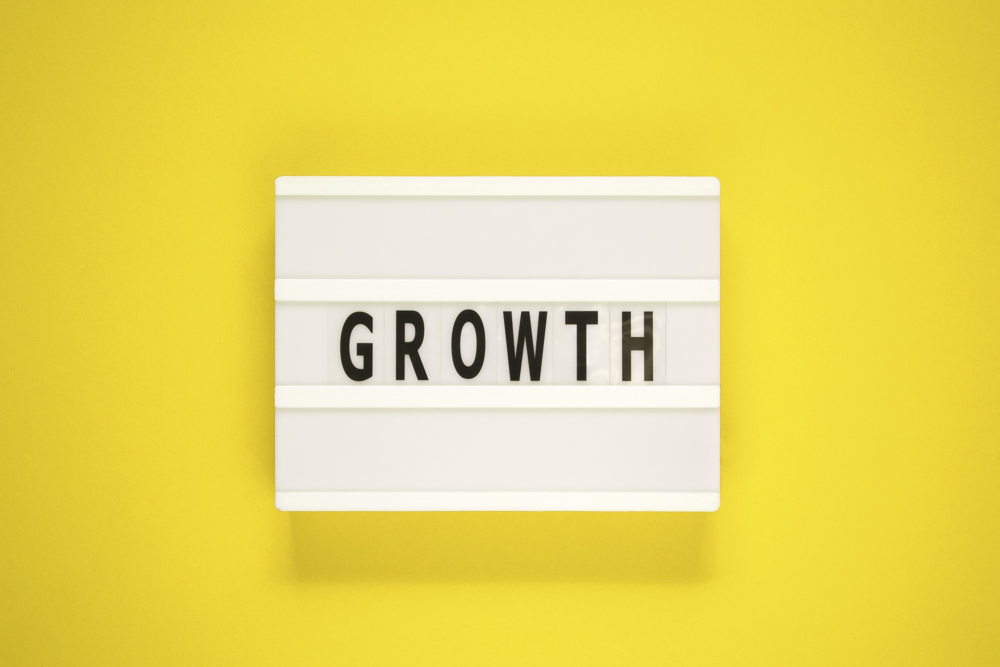 The word growth on lightbox. Business concept .Business success growing growth increase up concept.
