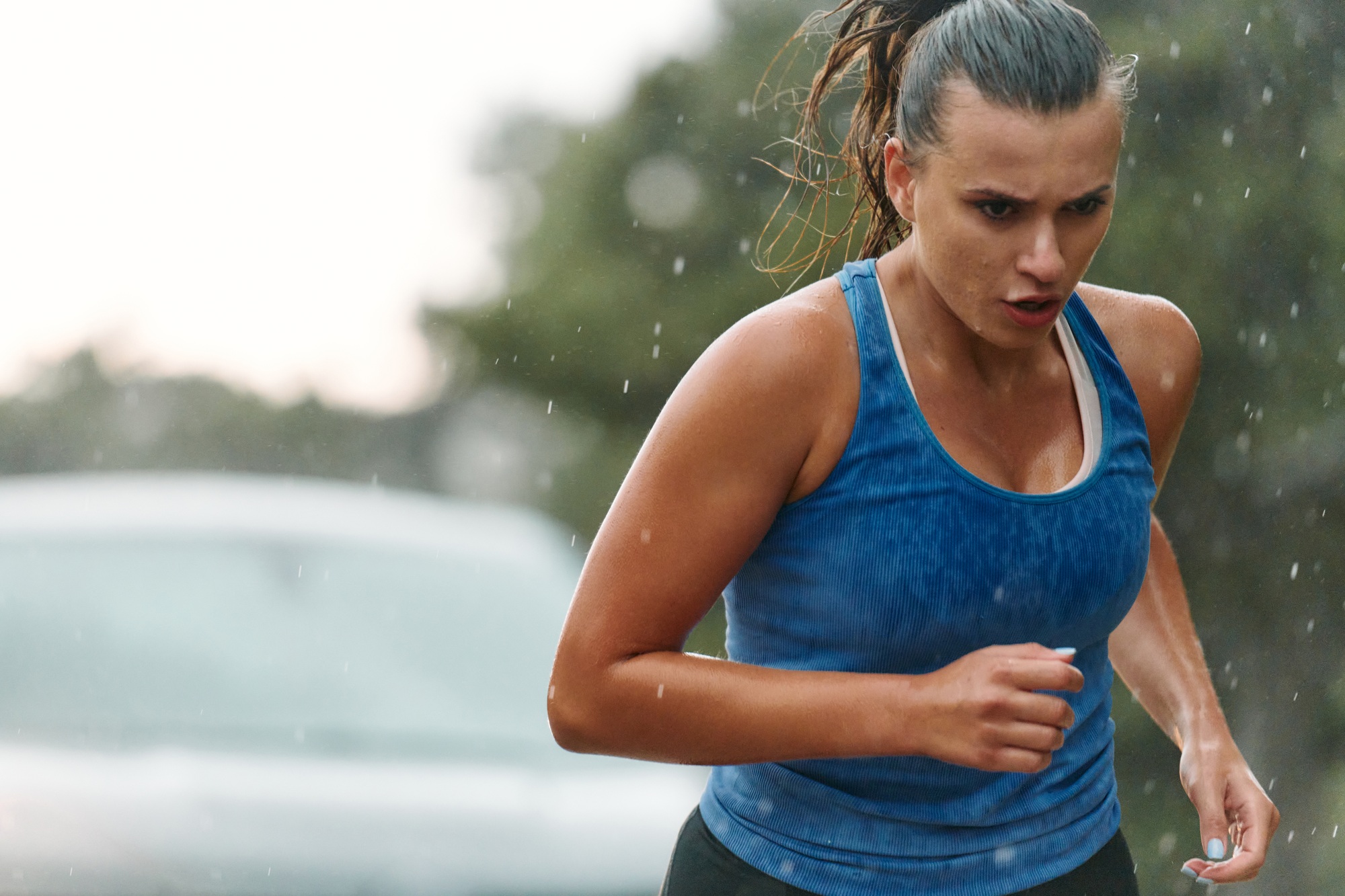 Unstoppable: A Determined Athlete Trains Through the Rain in Pursuit of Marathon Glory