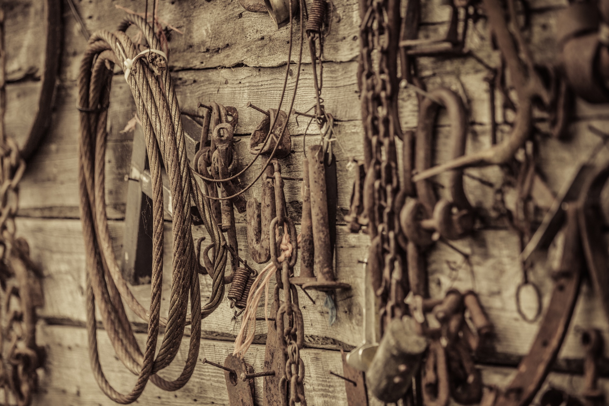 Wall Filled with Old Tools Hanging on the wall