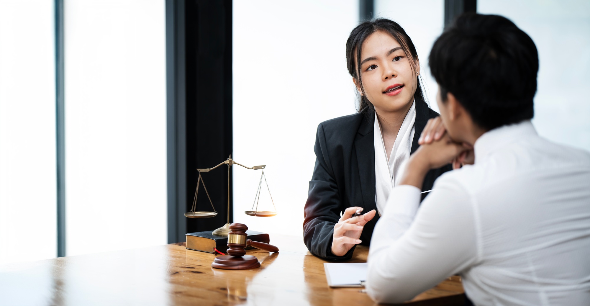 woman Lawyer discuss the contract and legal document agreement in office. Law and legal concept