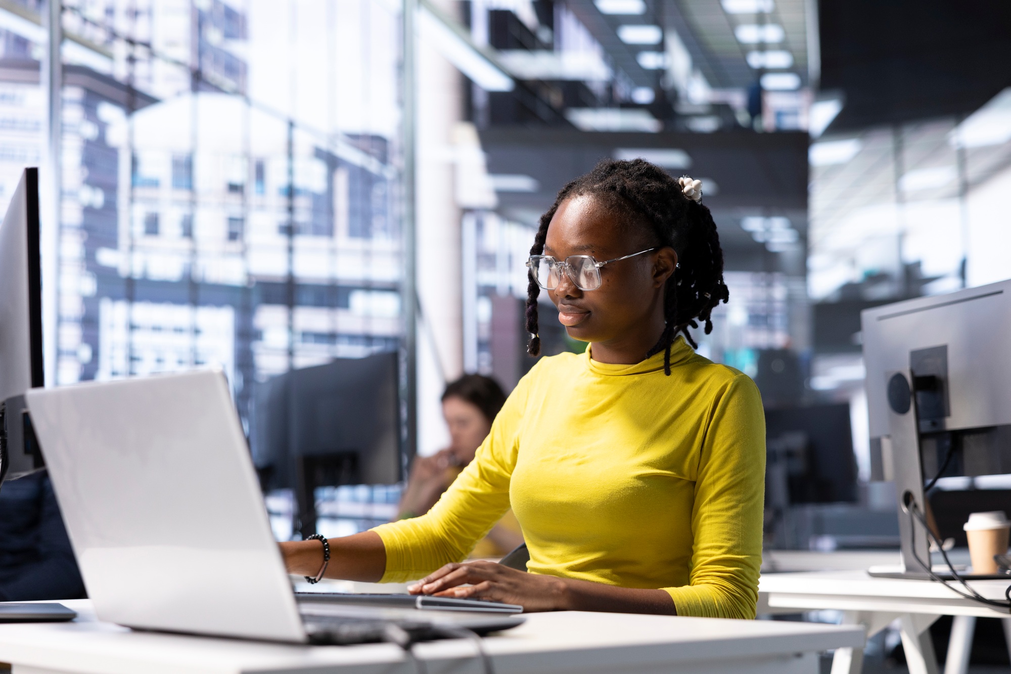 Woman optimizing company software for improved performance and scalability