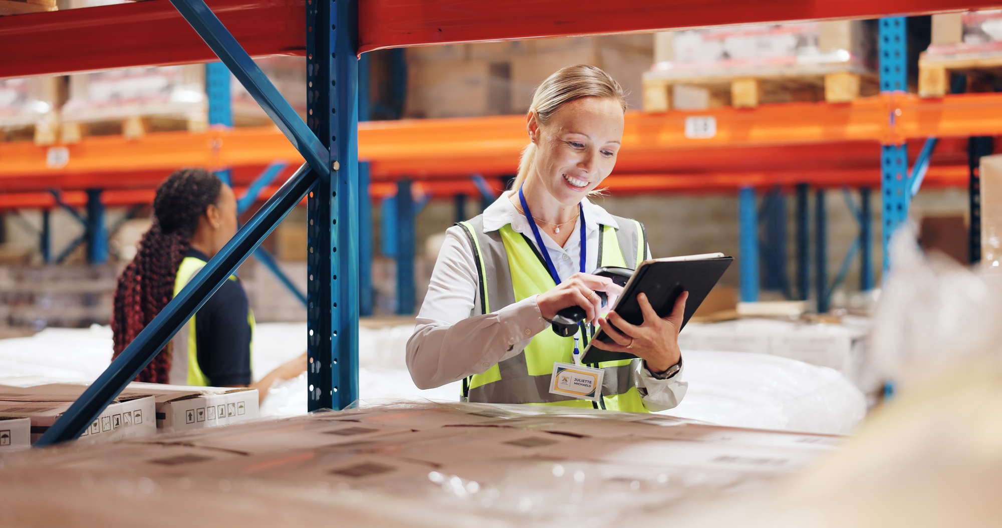 Woman, tablet and scanner for boxes in warehouse for e commerce, logistics or inventory of online o
