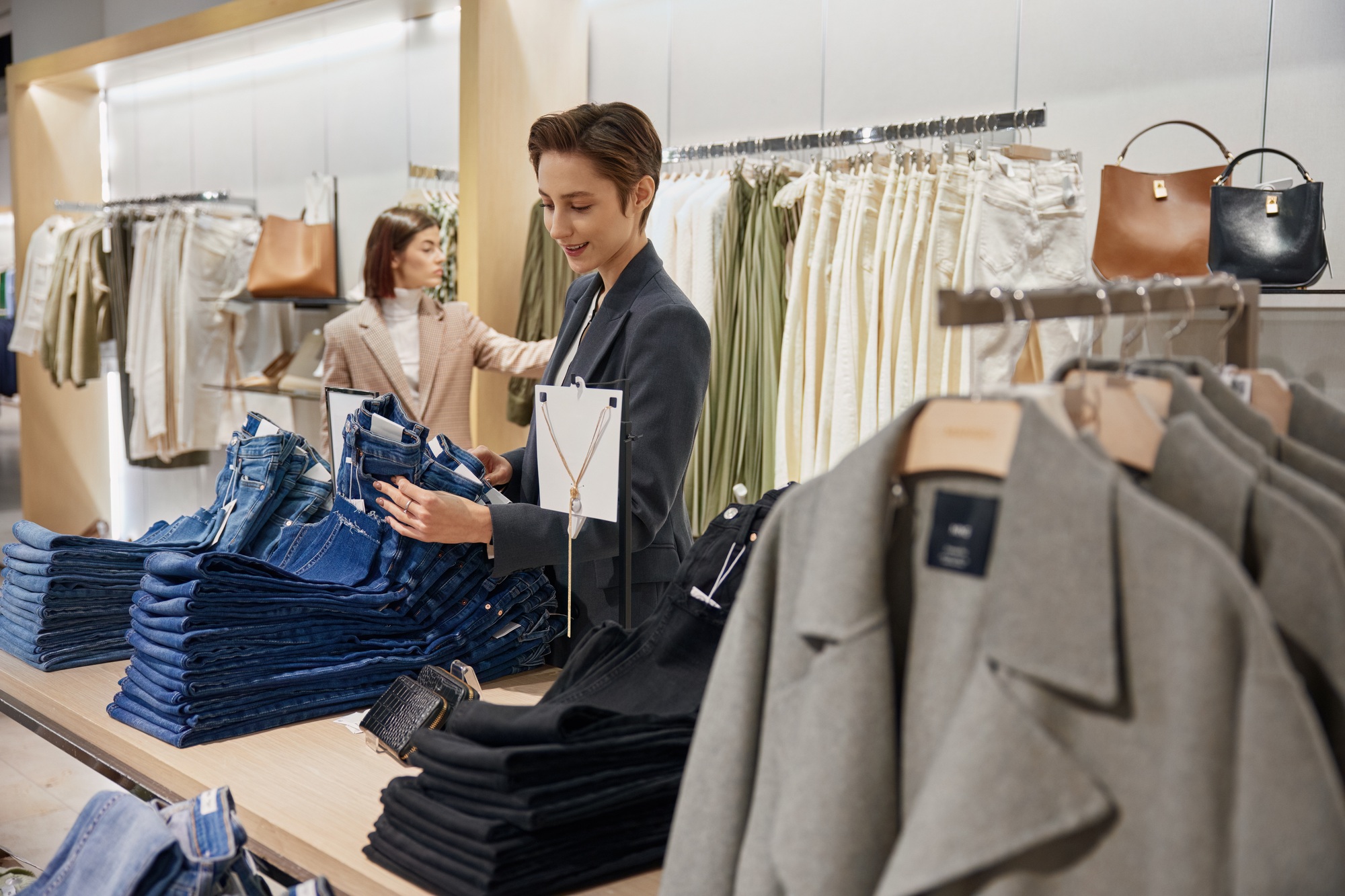 Women enjoying sale in store, shock price on new arrival concept