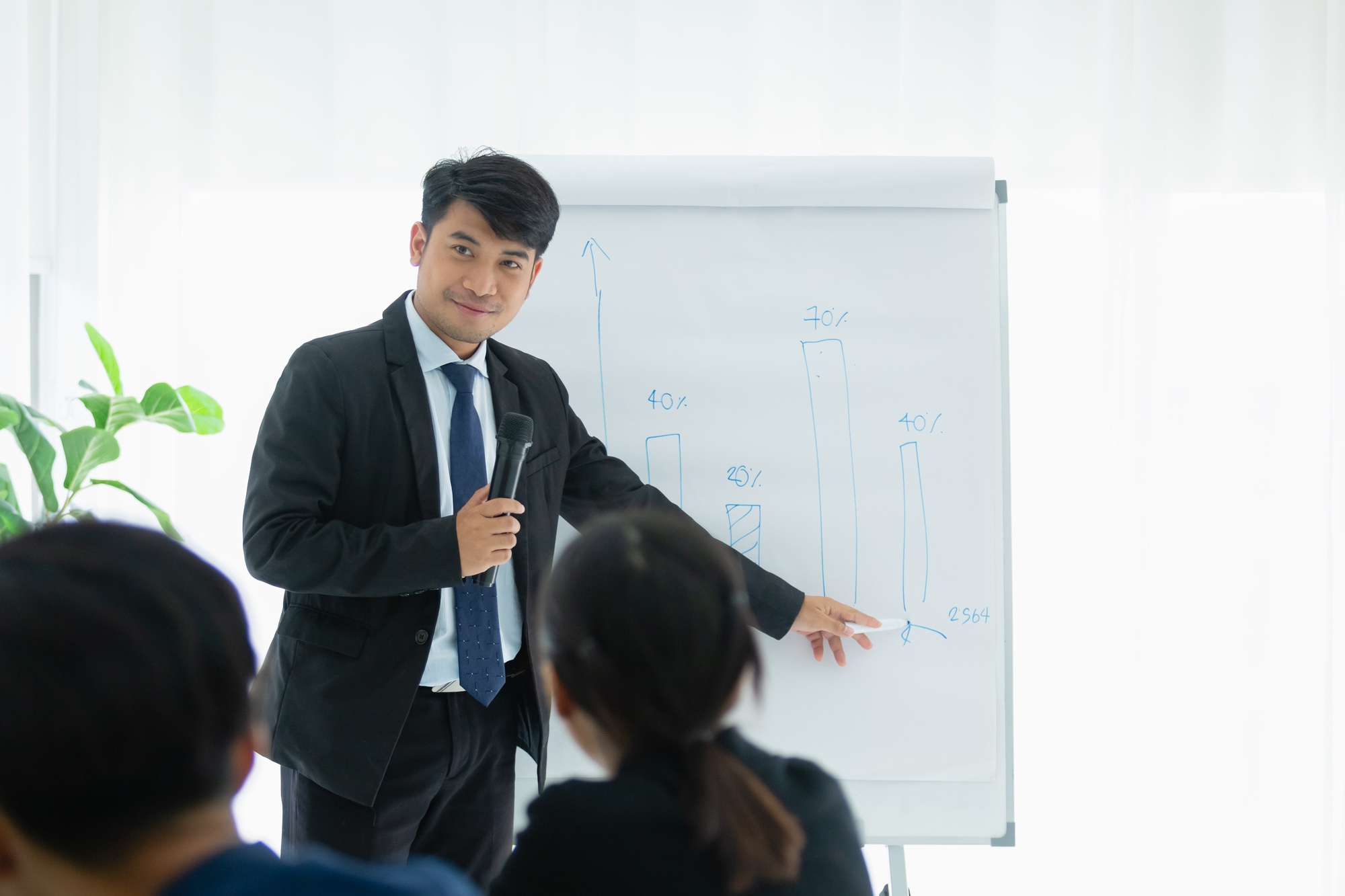 young businessman leader ?presentation seminar corporate in meeting room, training business person