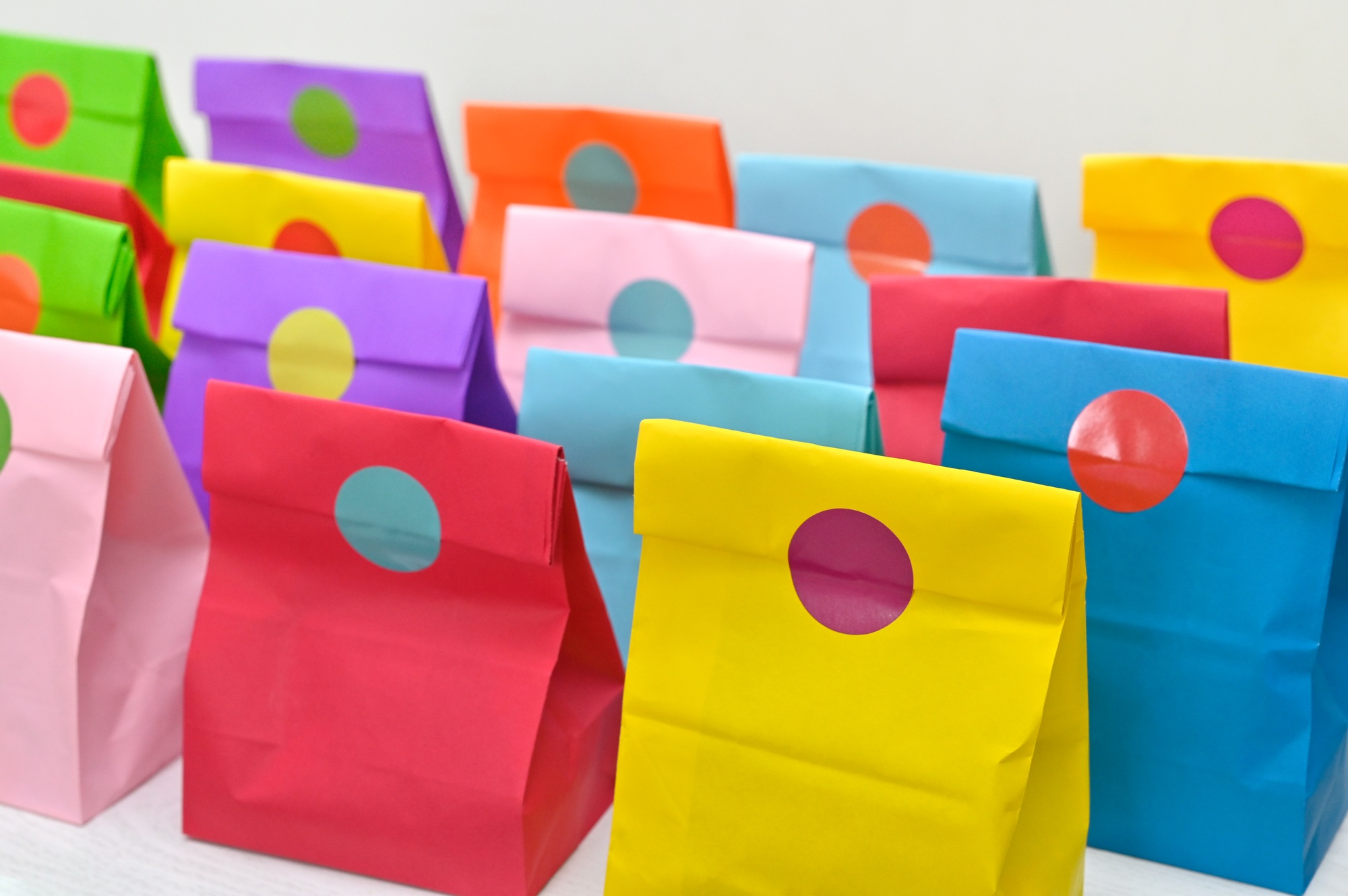 Colorful shopping folded paper bags mockup. Mock up for branding and corporate identity design.