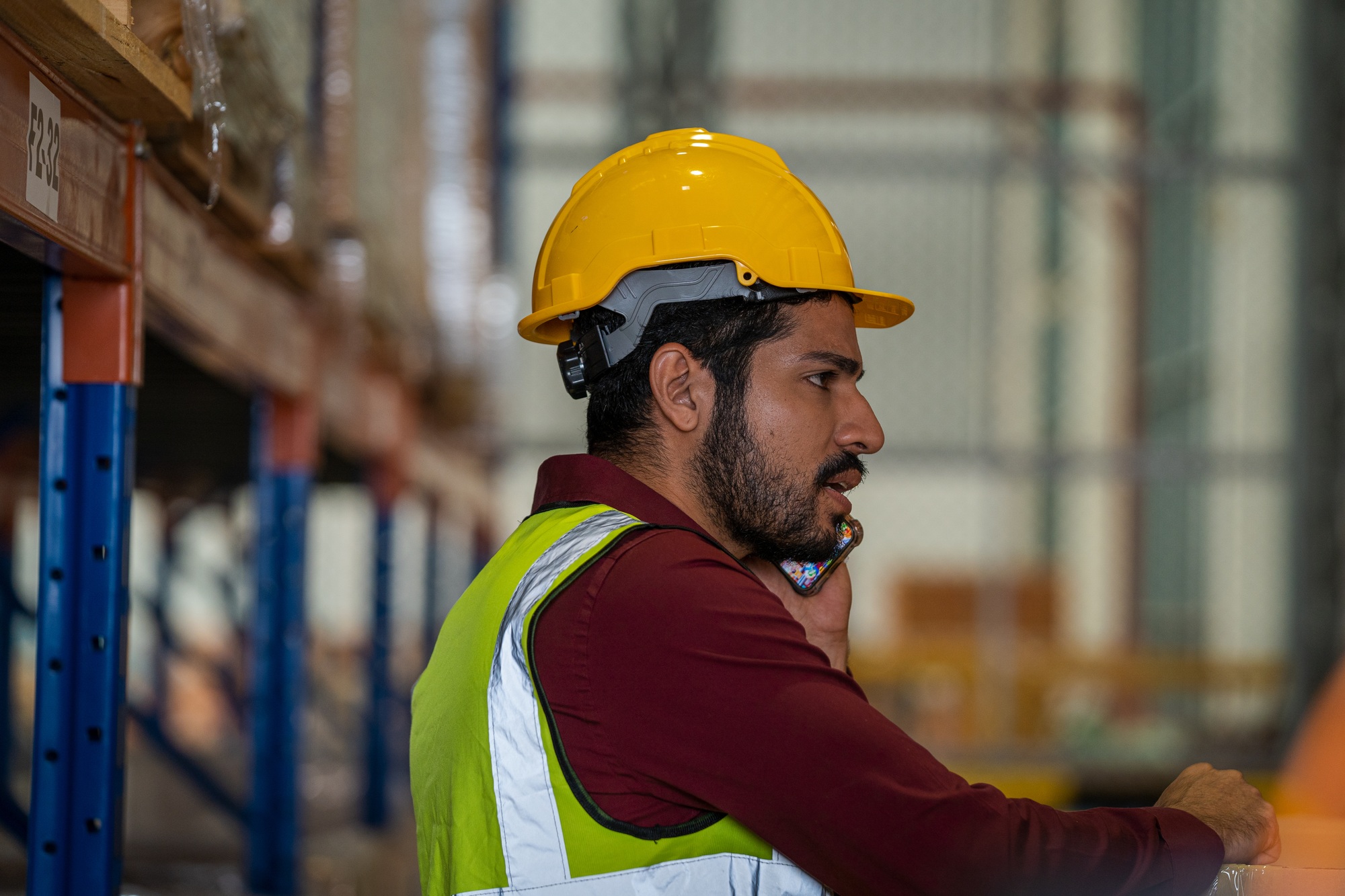 Warehouse employees uses digital tablet computer with Inventory checking software.