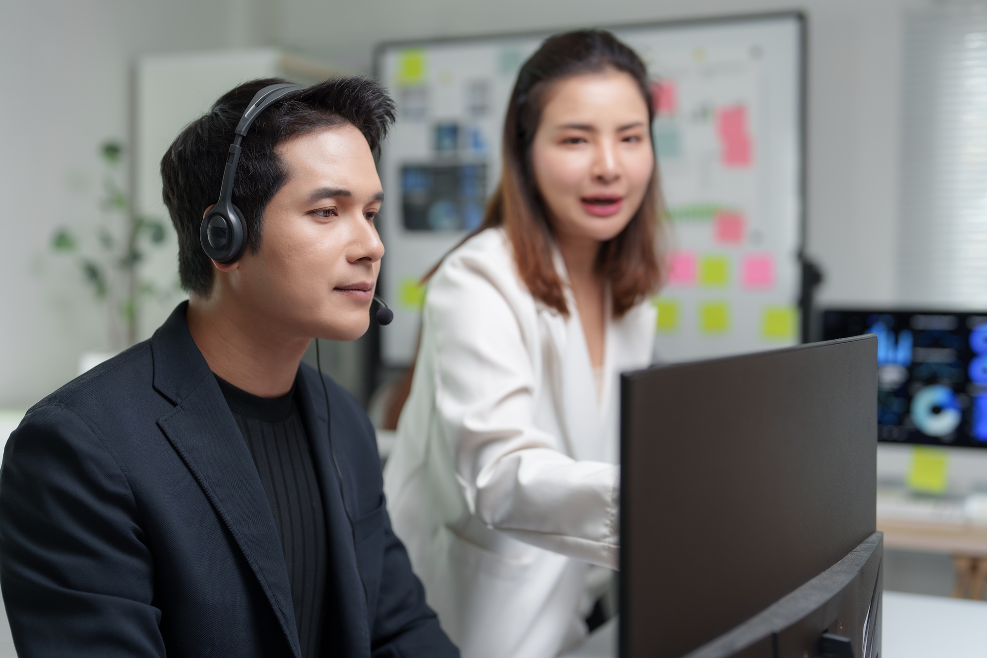 Asian business team working and providing online business consulting