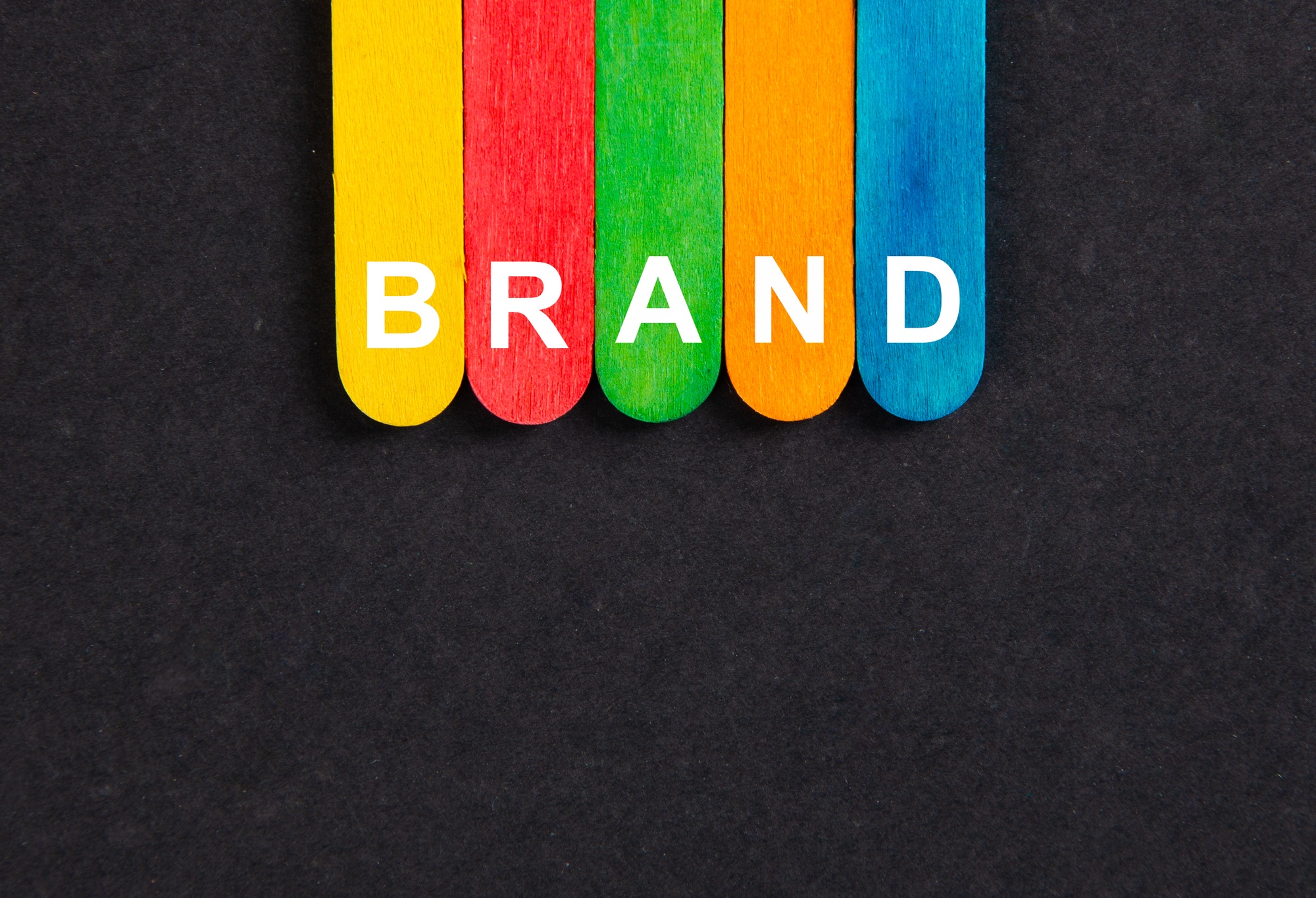 Business concept.Text BRAND writing on colored sticks