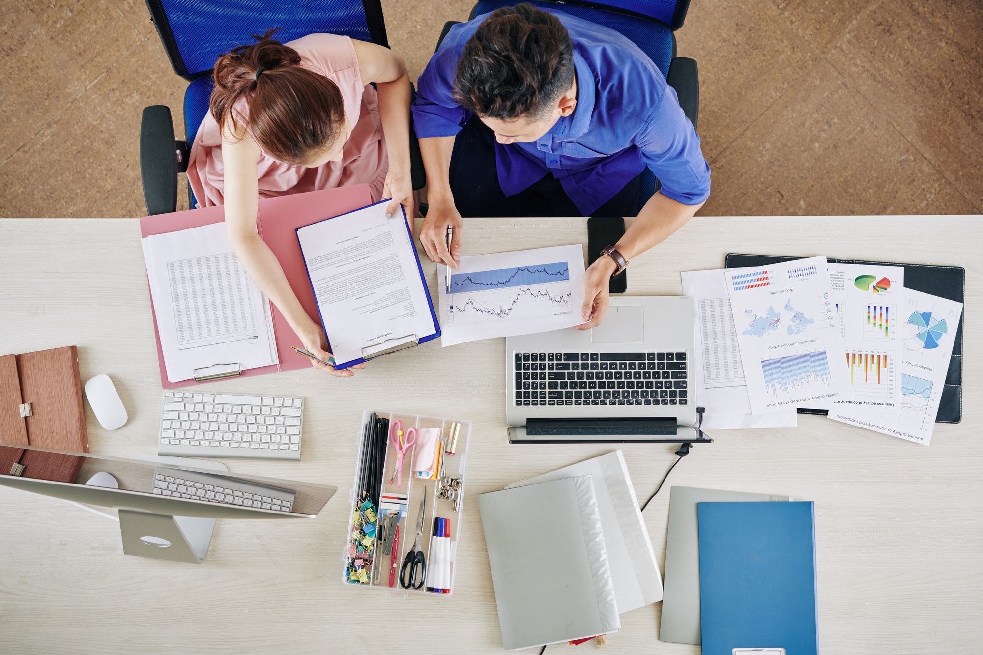 Business people analyzing monthly profits