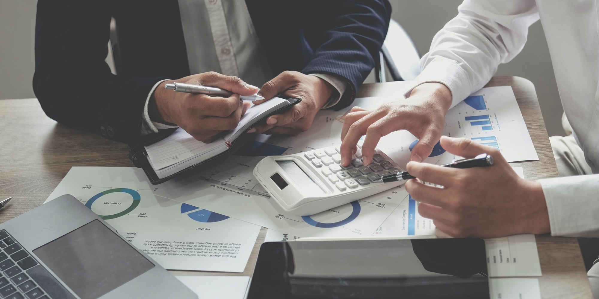 Business people are meeting for analysis data figures to plan business strategies