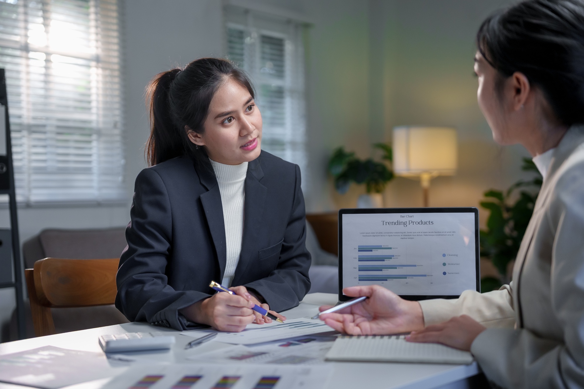 Business Professionals Analyzing Market Trends Together