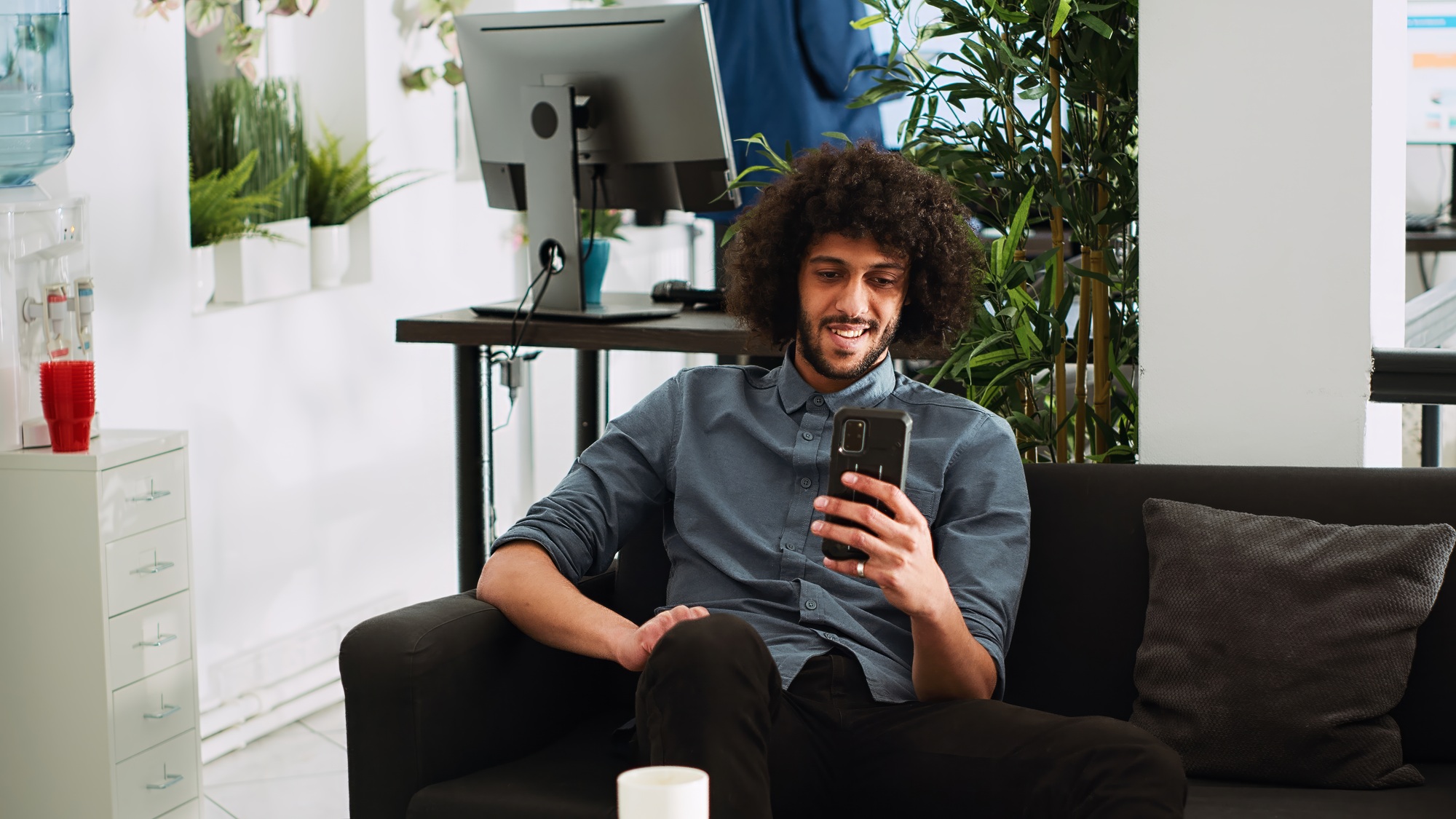 Businessman on break checking phone