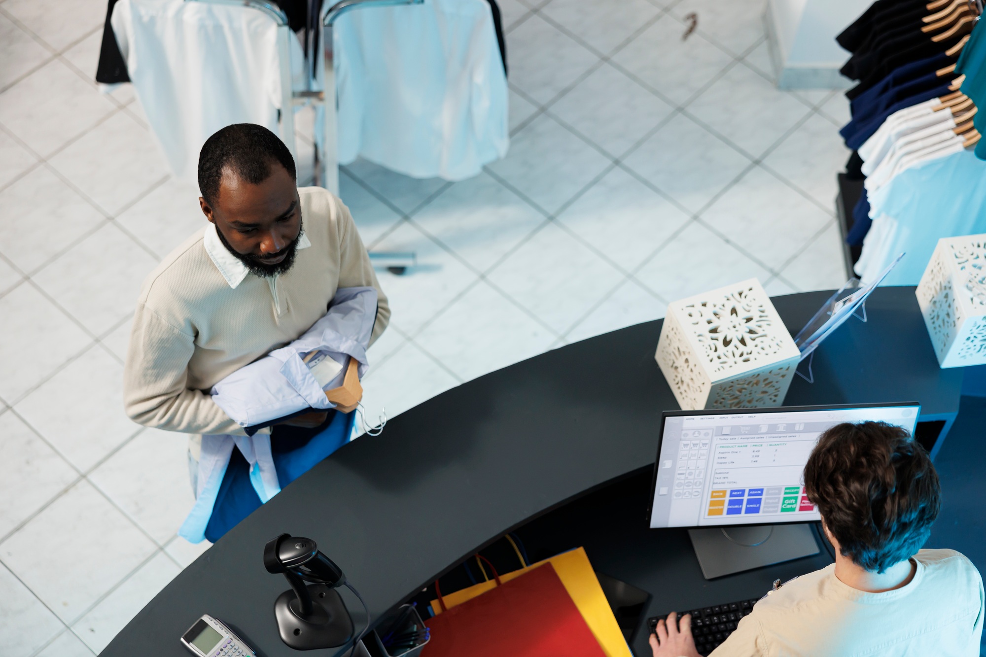 Buyer standing at checkout top view