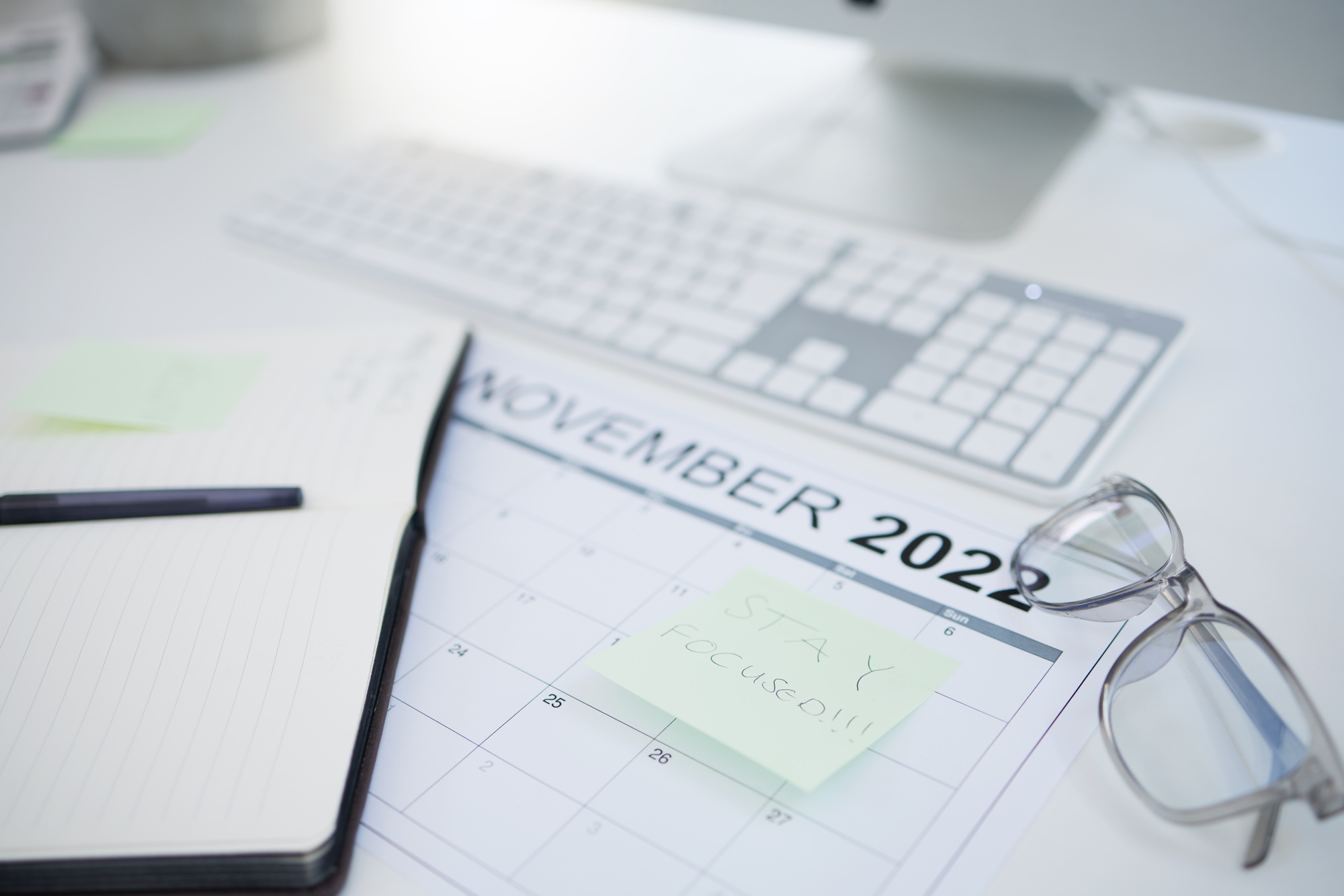 Calendar, schedule and management of a working business person planning goals and priorities at a t