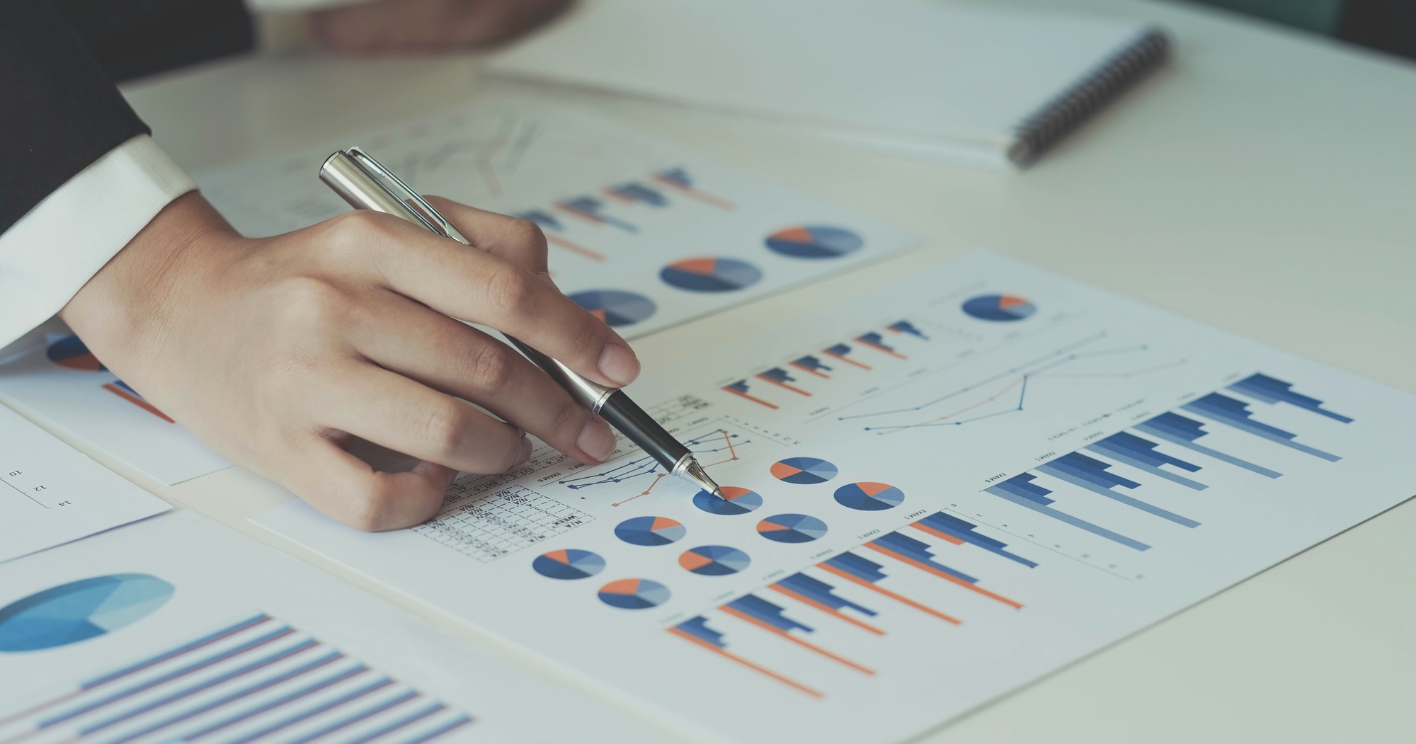 Close-up hands image, A businesswoman or female financial worker analysing financial data report