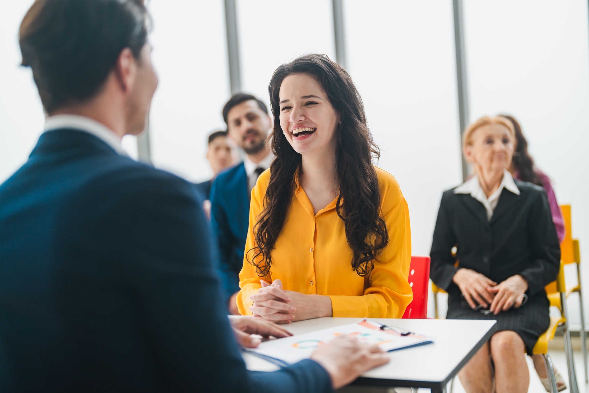 Happy business manager working at office meeting. Smiling male hr hiring recruit at job interview