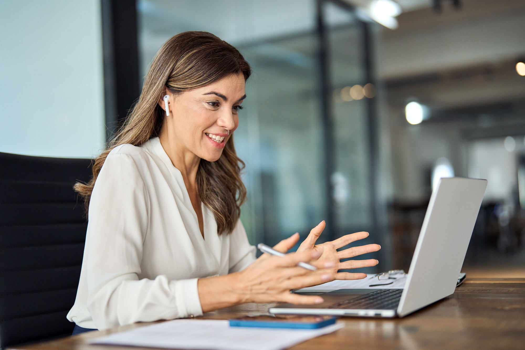 Happy professional mature female hr manager having online job interview.