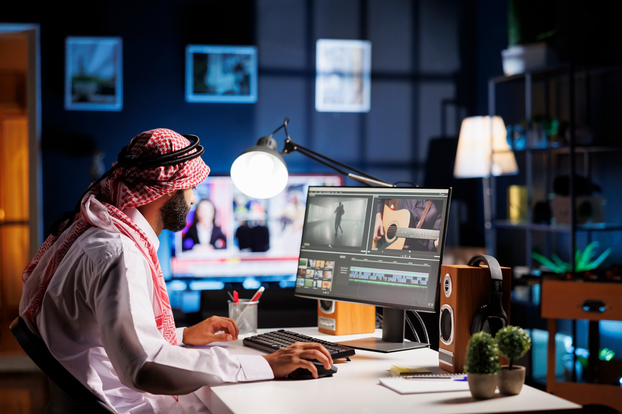 Man works with video footage and sound