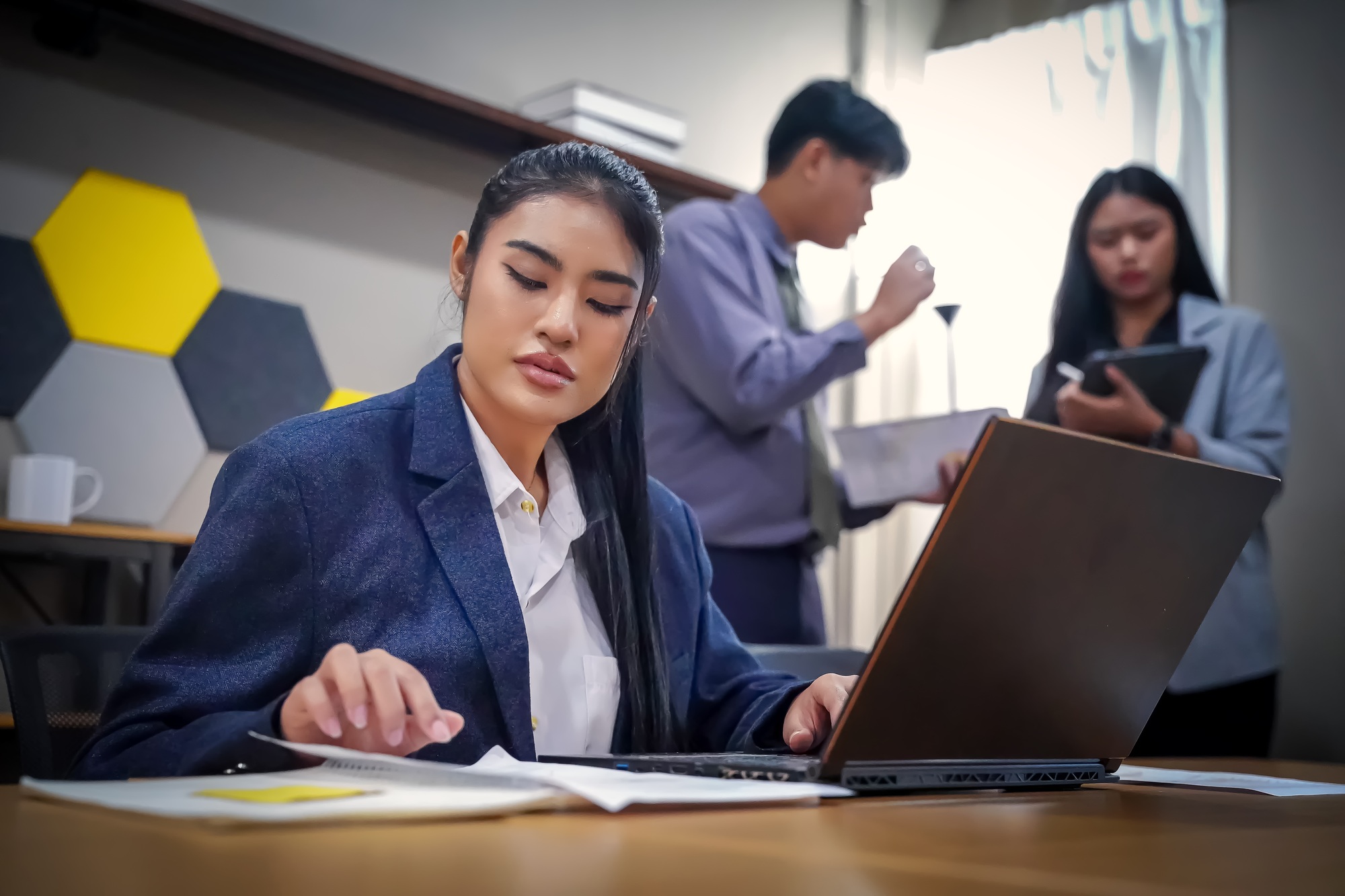 Professional team collaborating in a modern office space during a business meeting