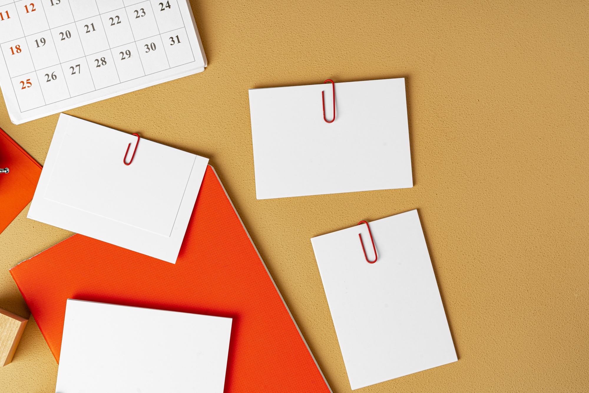 Red and white blank branding paper on beige background