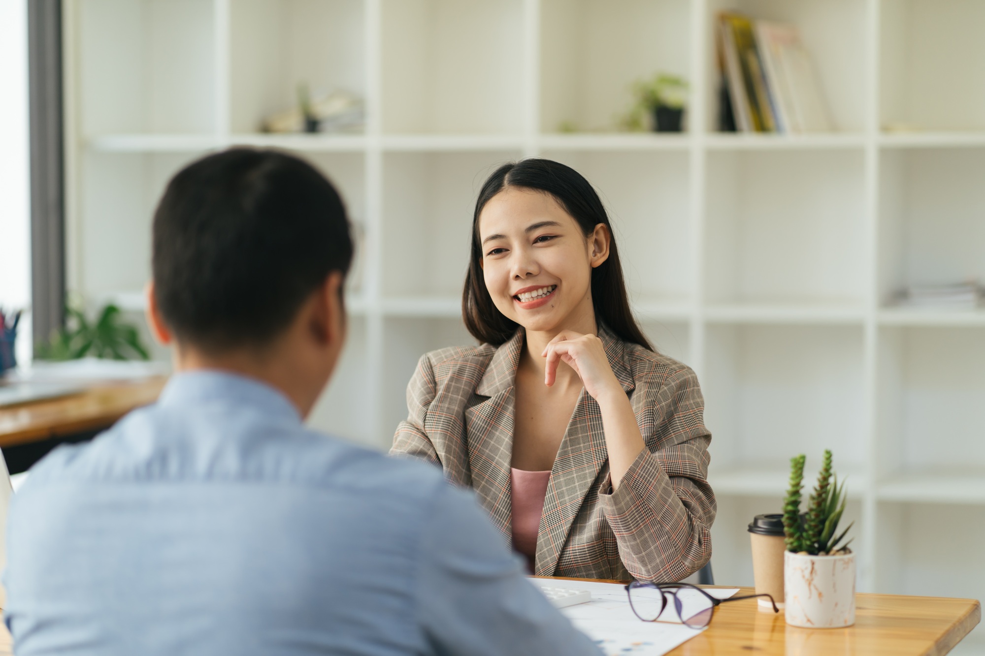 Skilled female leader of marketing experts working group explaining successful strategy for startup