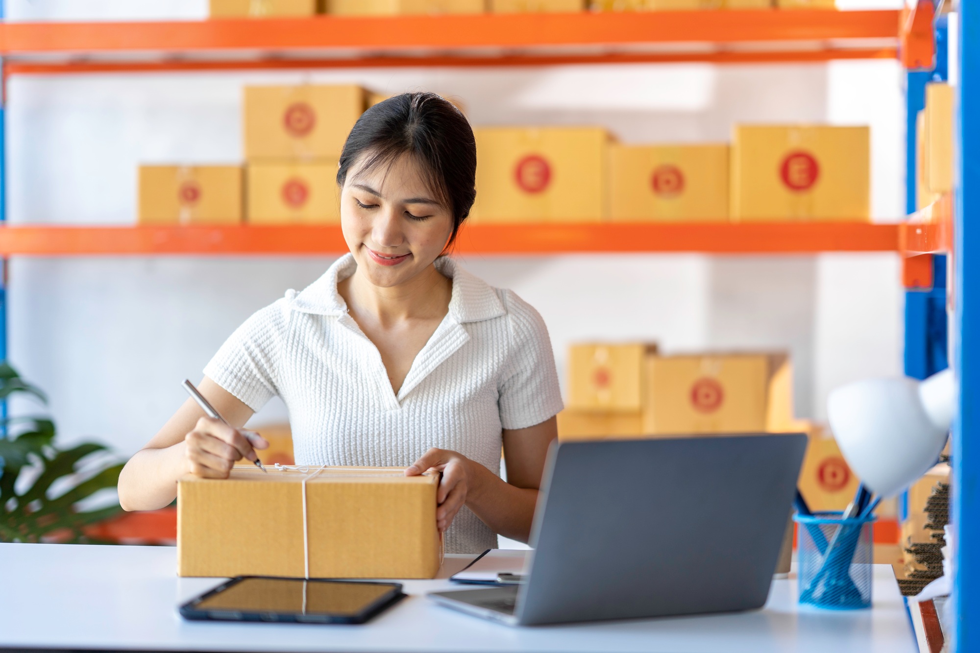 SME entrepreneur Small business entrepreneurs Online selling ideas,Happy Young Asian business owner