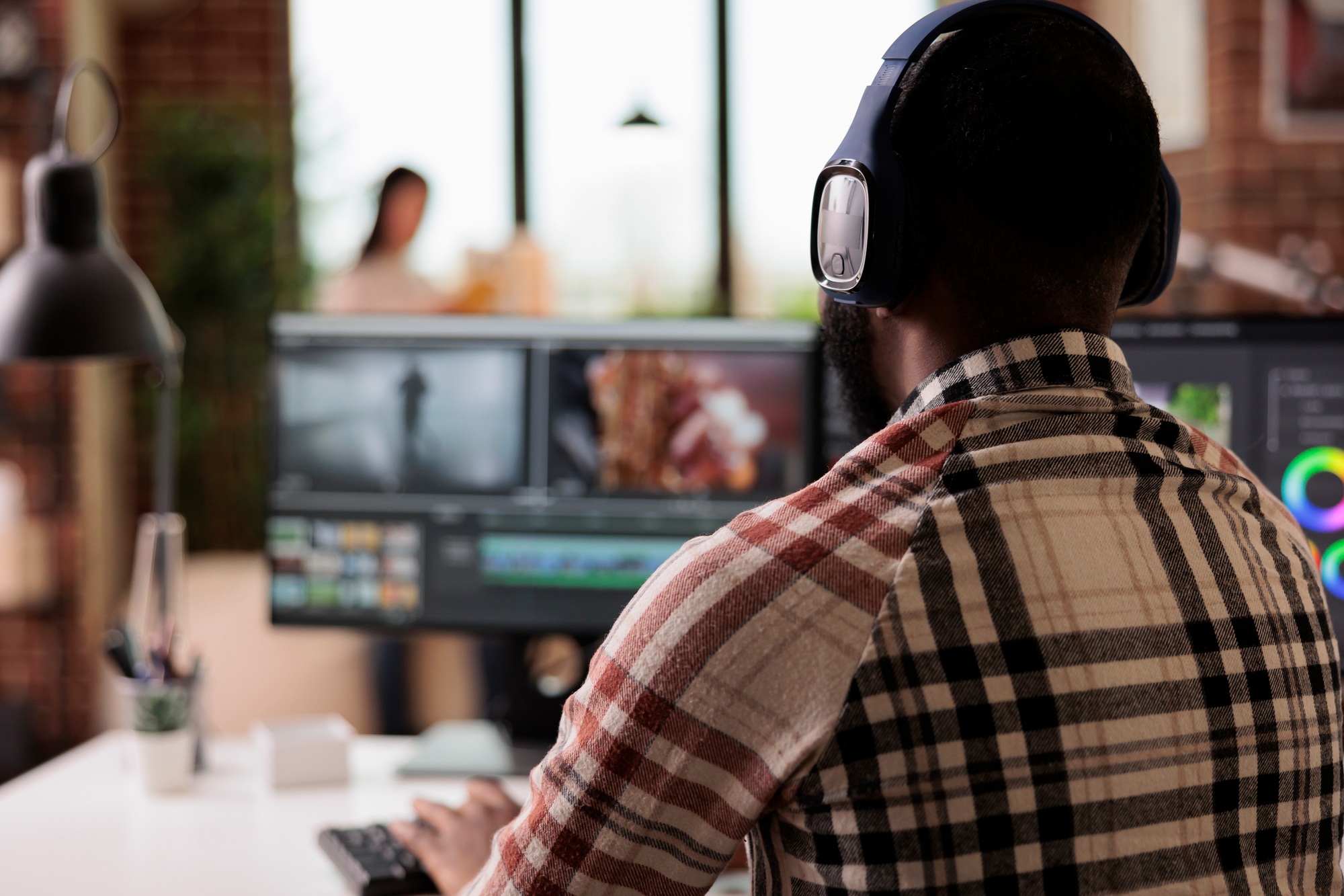 Video editor editing film footage on software