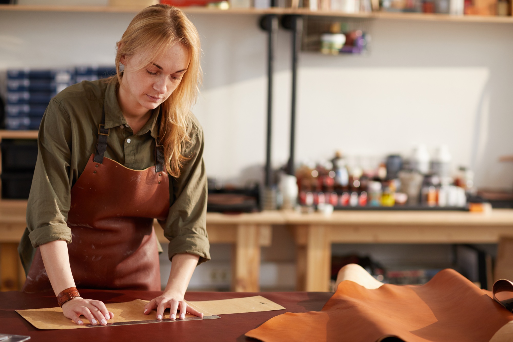 Woman in Leather Shop