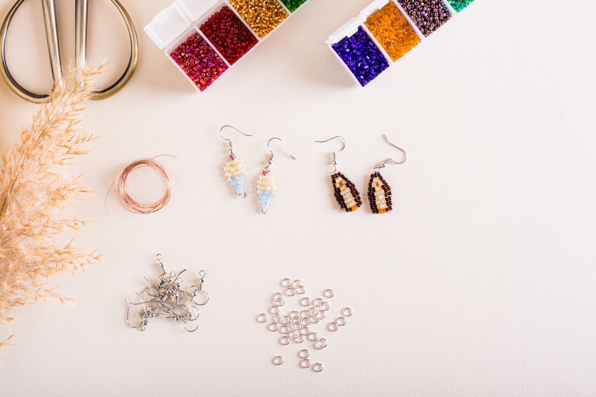 Working tools, beads and accessories for making jewelry. Needlework and handmade. Top view