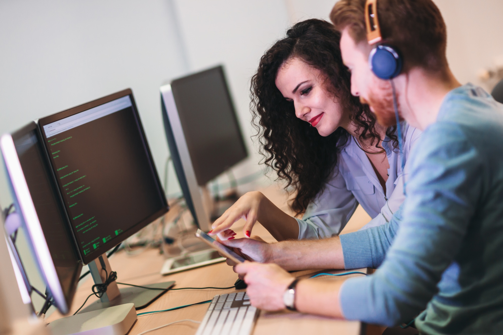 Software engineers working on project and programming in company