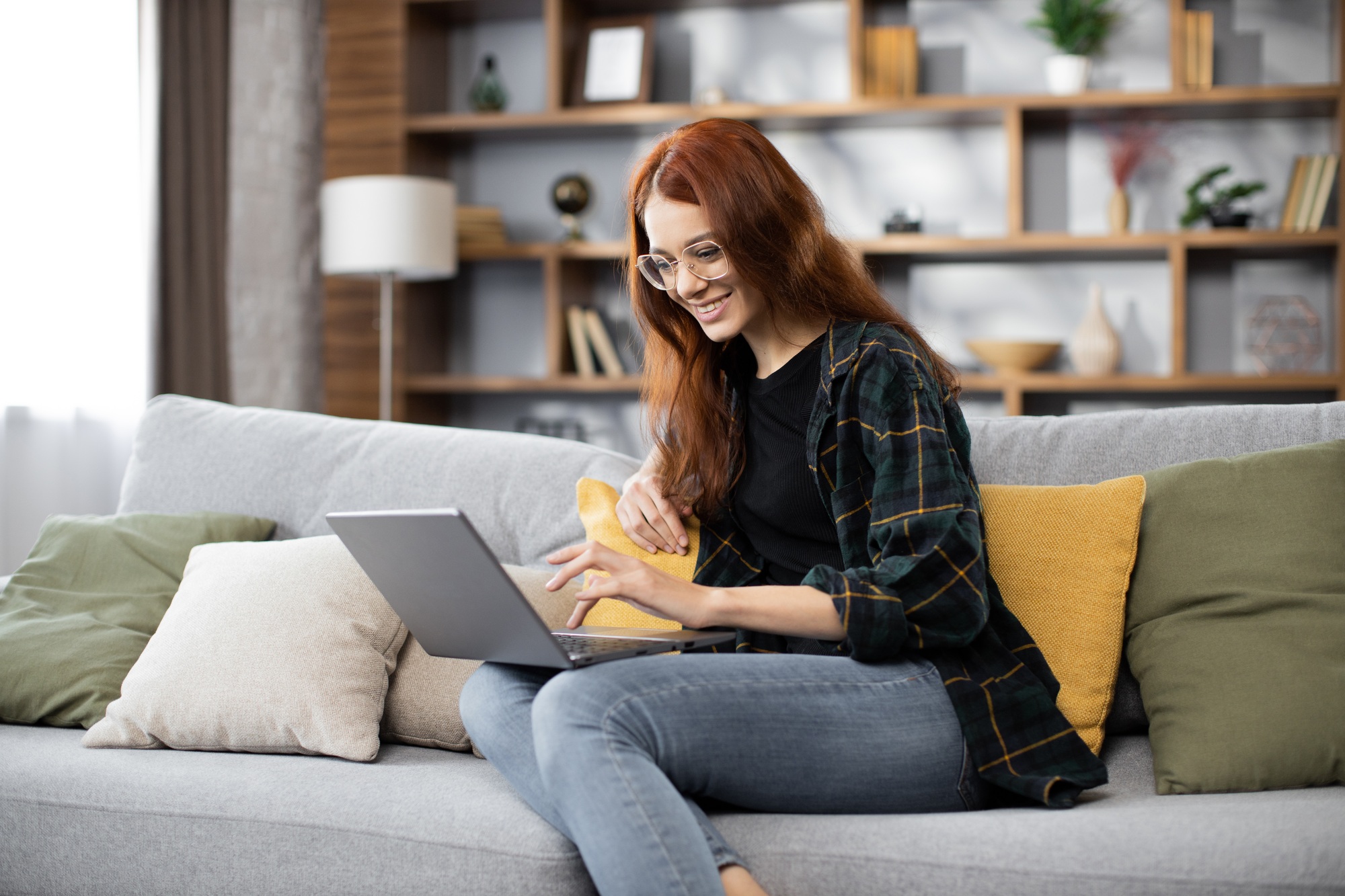 Young woman doing research work for her business.