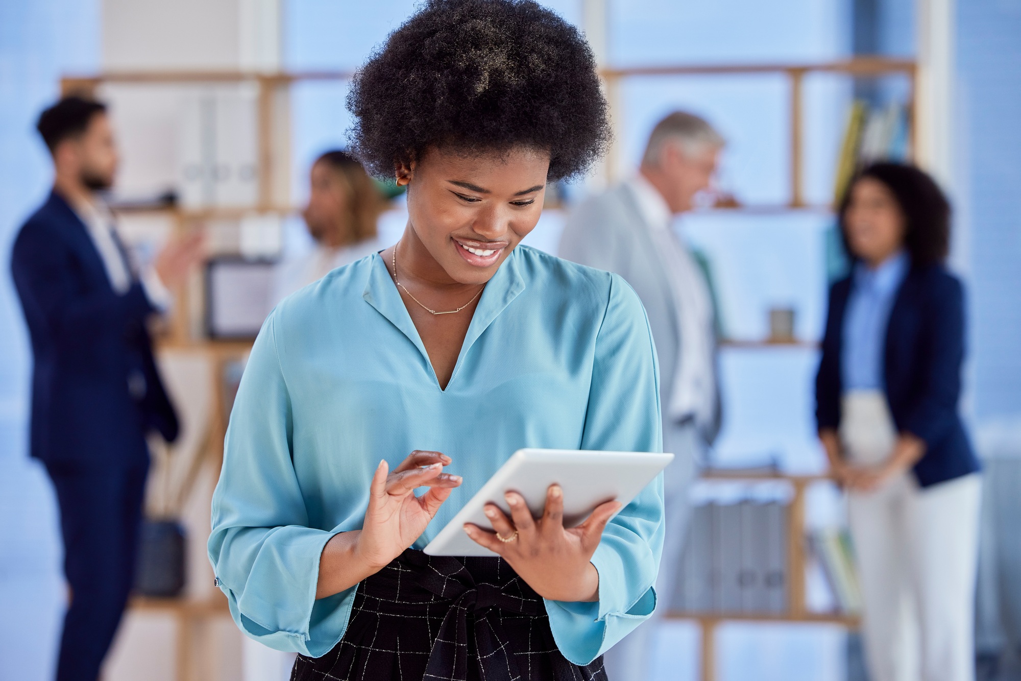 Black woman on tablet for office management, employee engagement and workflow in Human Resources. B