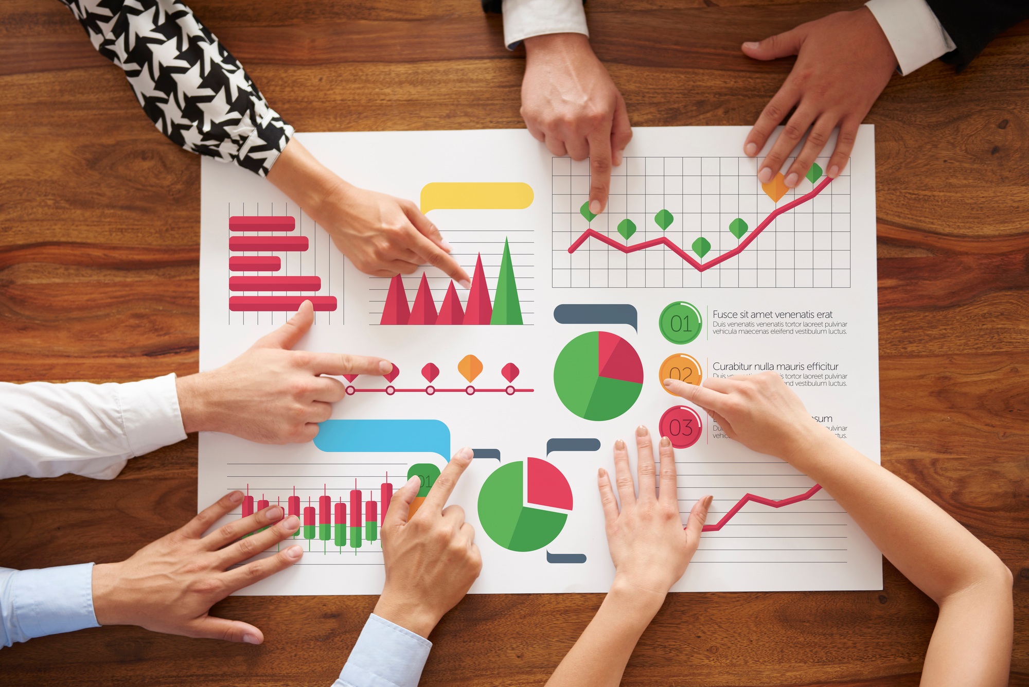 Business people analyzing many charts