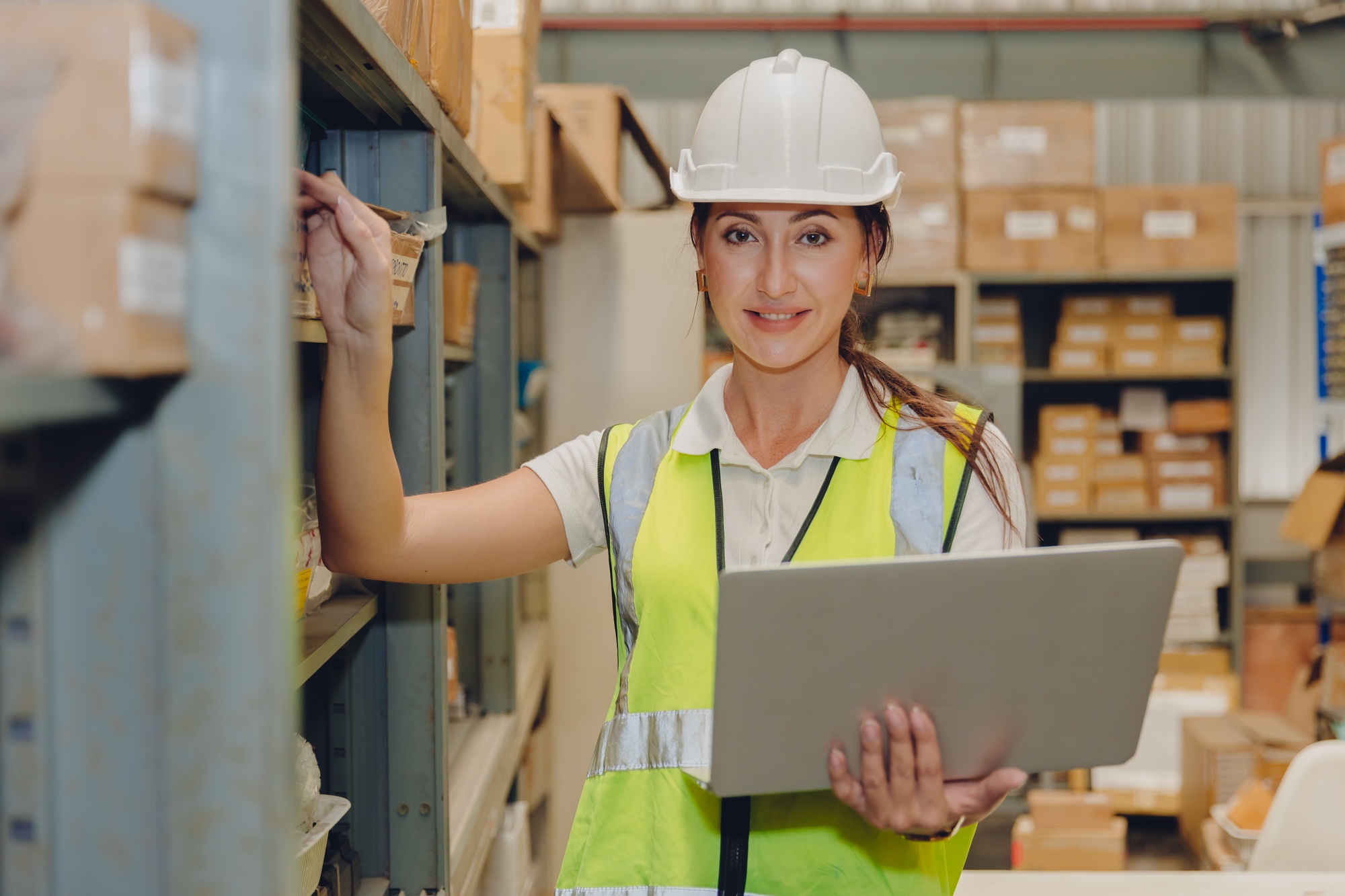 Stock inventory staff women worker with computer software online management warehouse