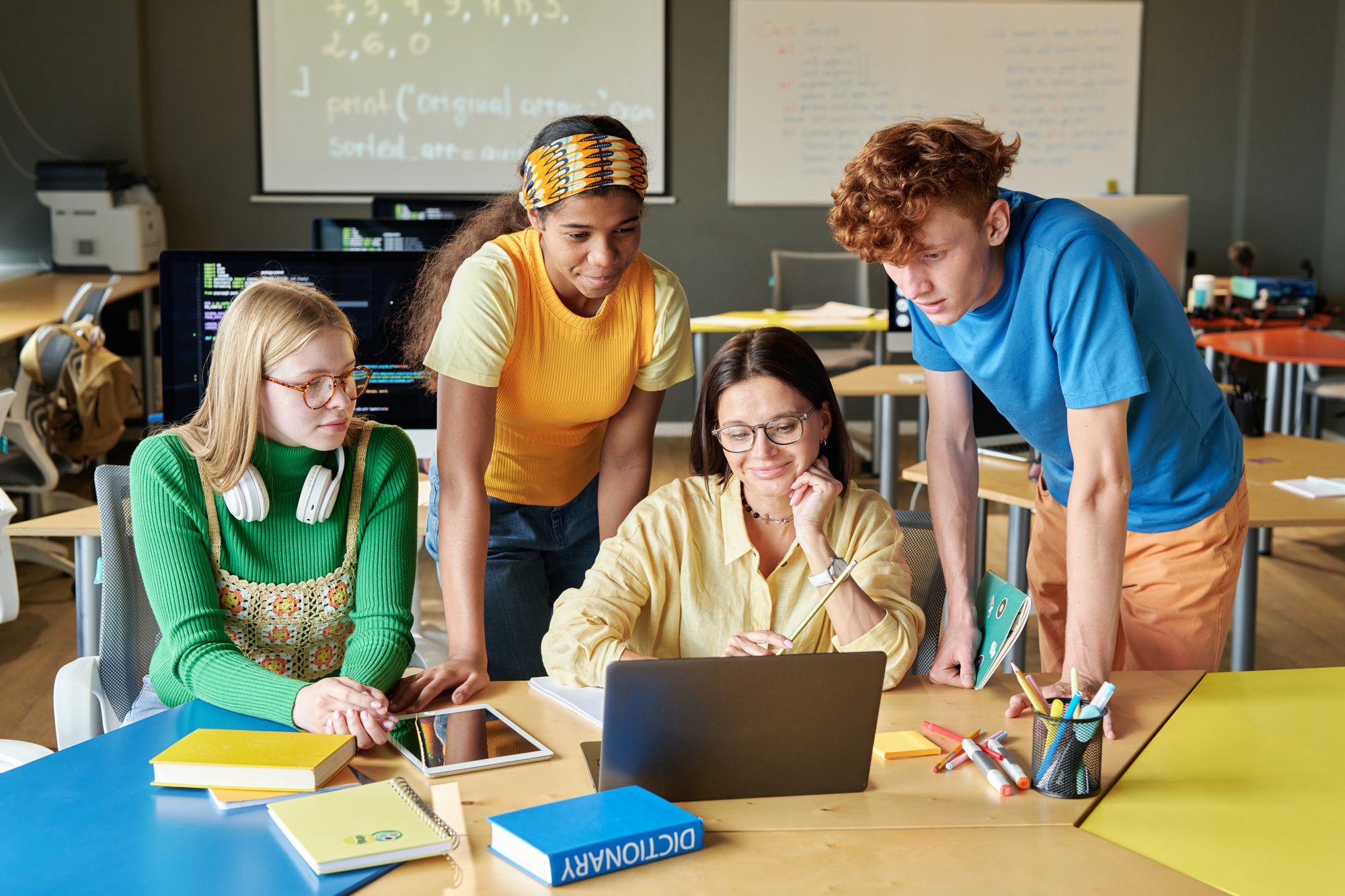 Students Collaborating on Software in Classroom